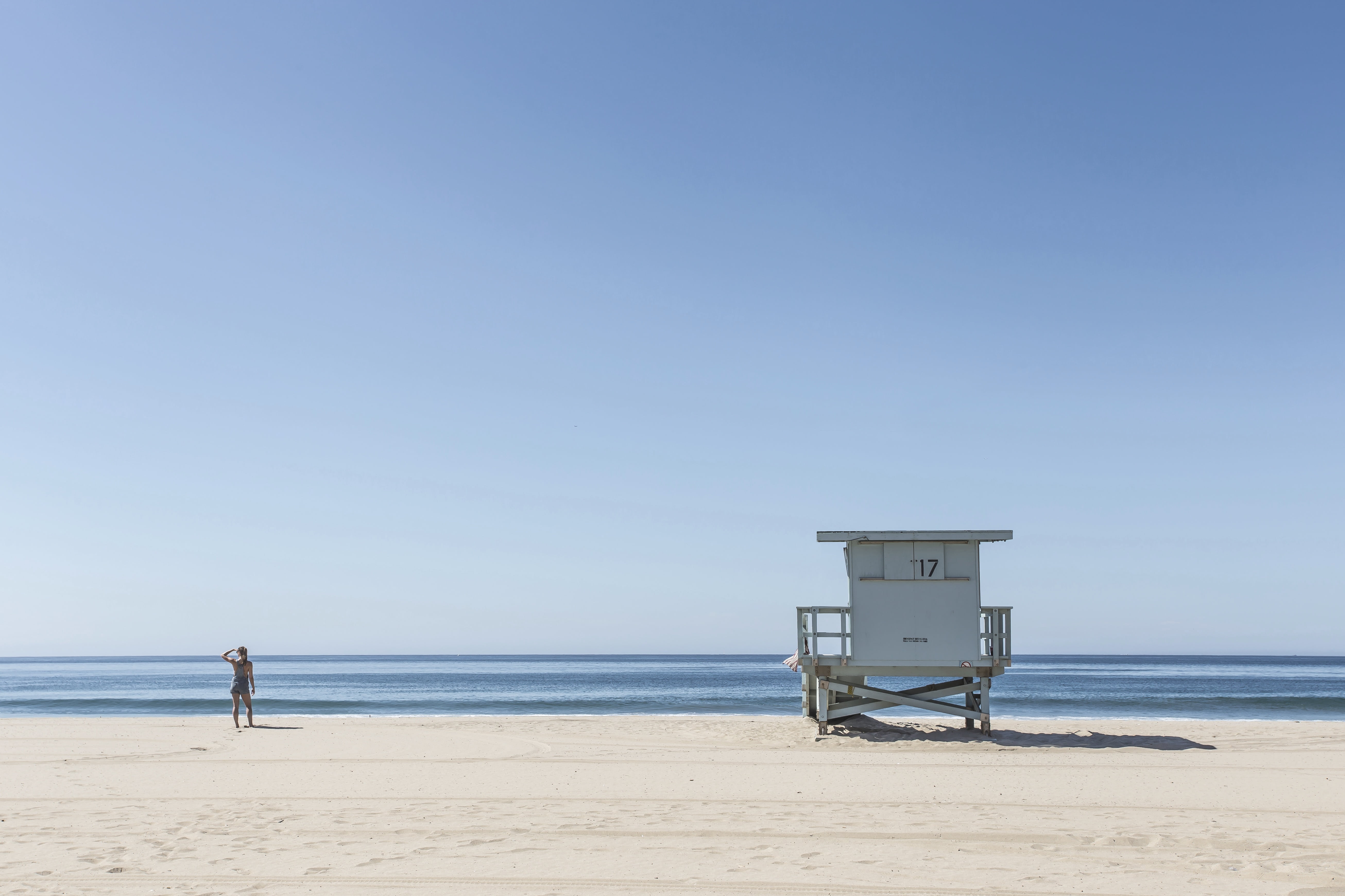 water, sunshine, hut, time, tranquility, wooden, woman, protection, security, white, man made structure, safety, nature, thirds, horizon, ocean, clear sky, HD Wallpaper