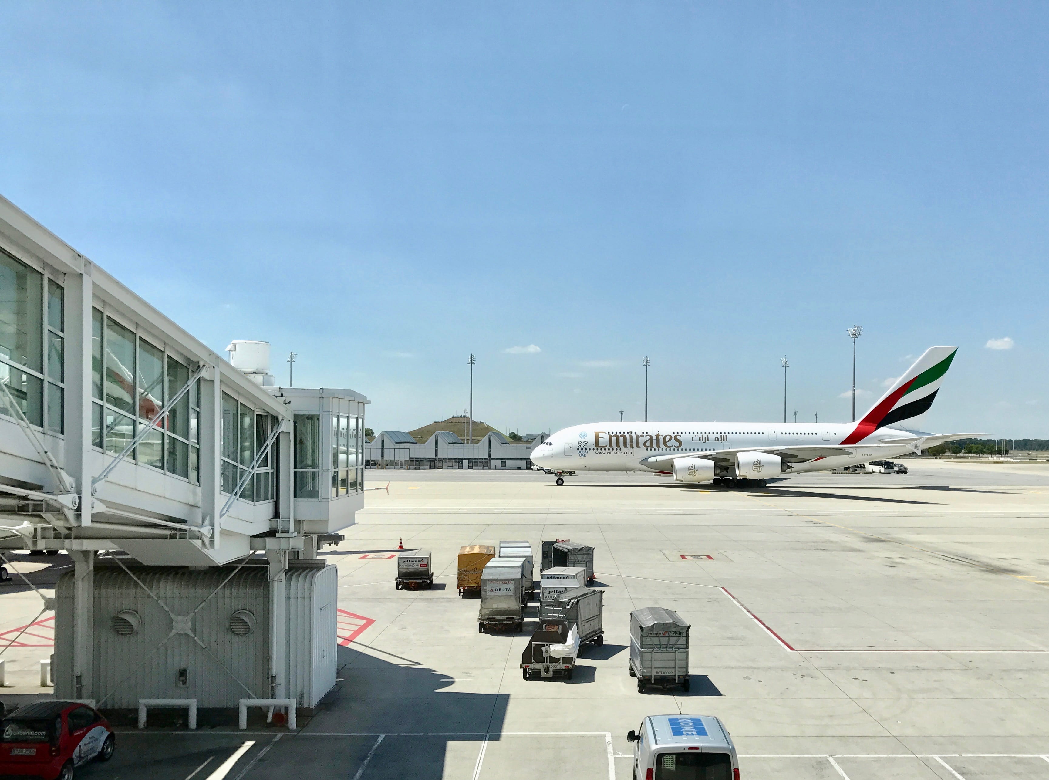 landing, land vehicle, sunlight, passenger boarding bridge, emirates, journey, airplane, cloud, wanderlust, window, walkway, airport runway, air vehicle, HD Wallpaper