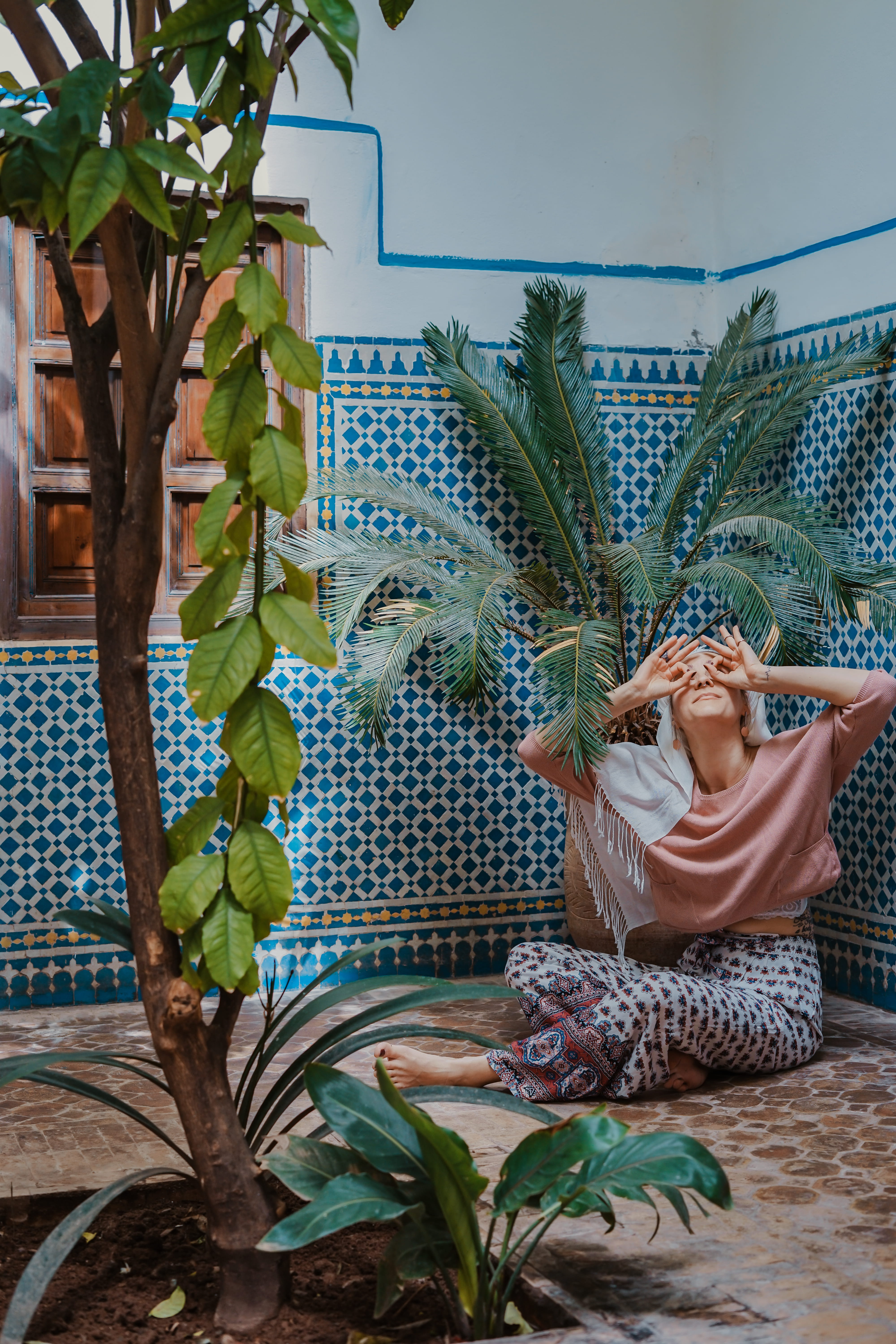human, person, flora, one person, leisure activity, plant part, potted plant, patio, nature, young adult, floor, adult, morocco, lifestyles, plant, outdoors, Phone HD Wallpaper