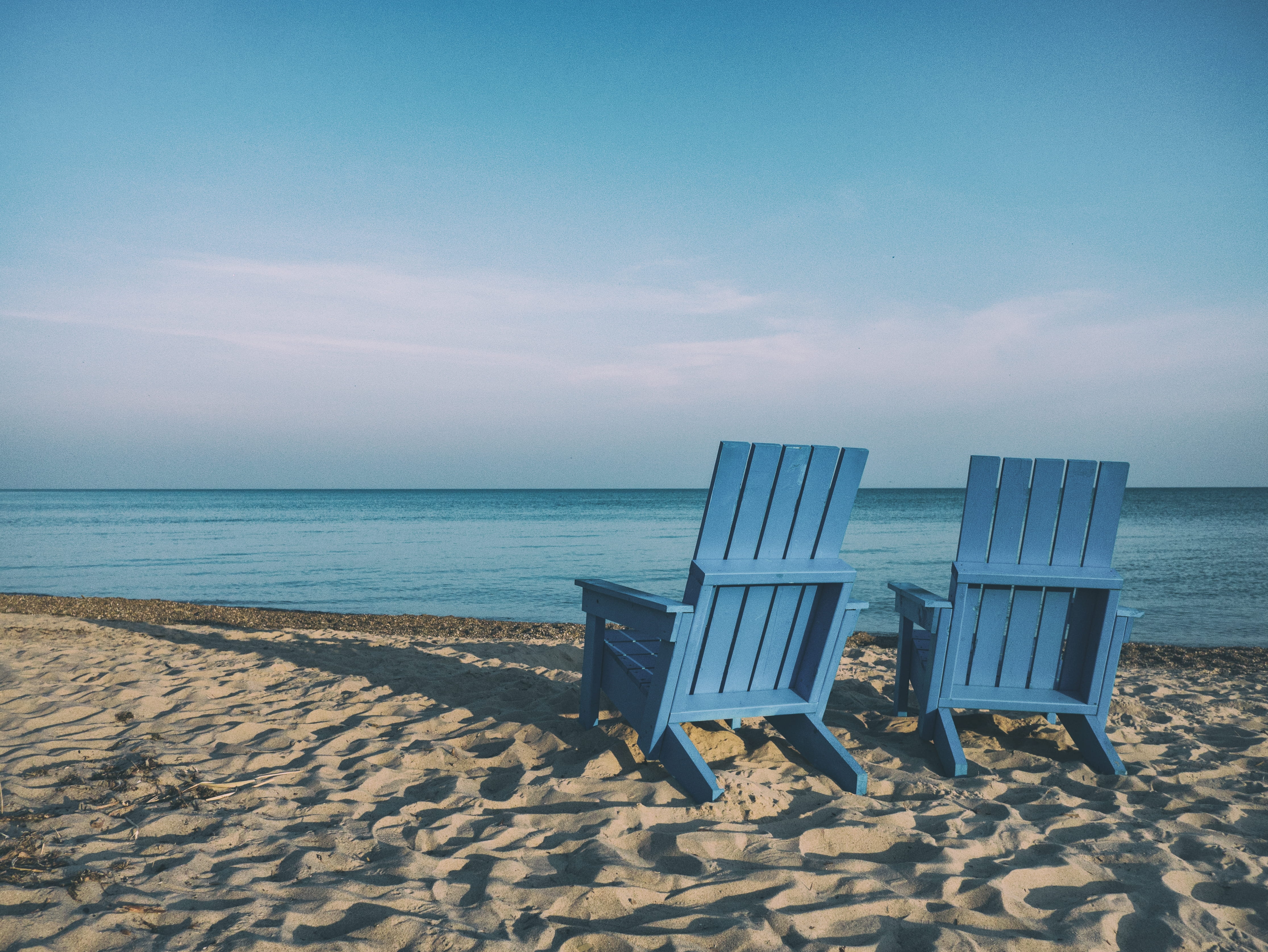 shore, travel Destinations, outdoor chair, horizon over water, idyllic, coastline, relaxation, empty, outdoors, near, travel, beach, cloud - sky, 4K, nature, HD Wallpaper