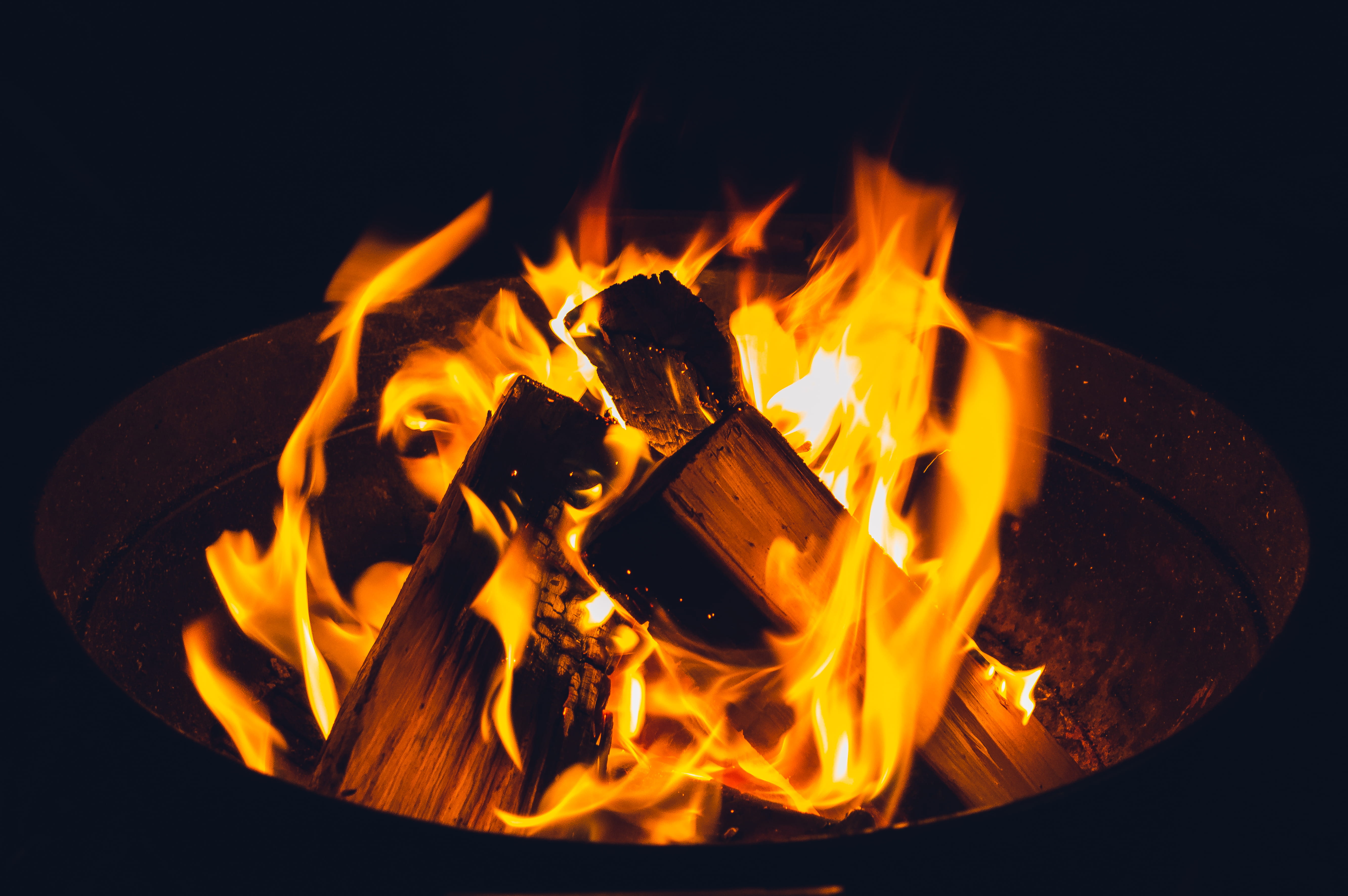 heat - temperature, fireplace, yellow, firewood, motion, 5K, photo, fire - natural phenomenon, fire, lighted, nature, orange, firepit, dark, night, warmth, HD Wallpaper