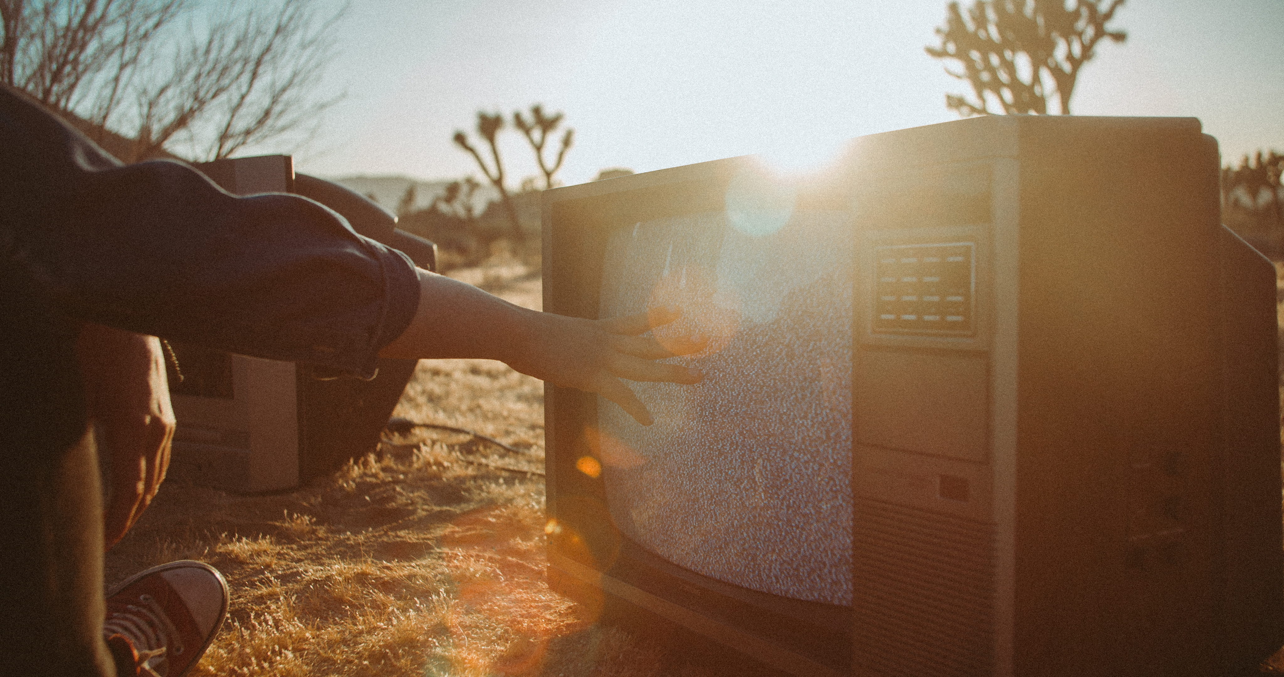 technology, television, one person, abstract, lens flare, film, touching, sunlight, adult, young adult, daytime, vintage, outdoor, sky, sunset, screen, HD Wallpaper