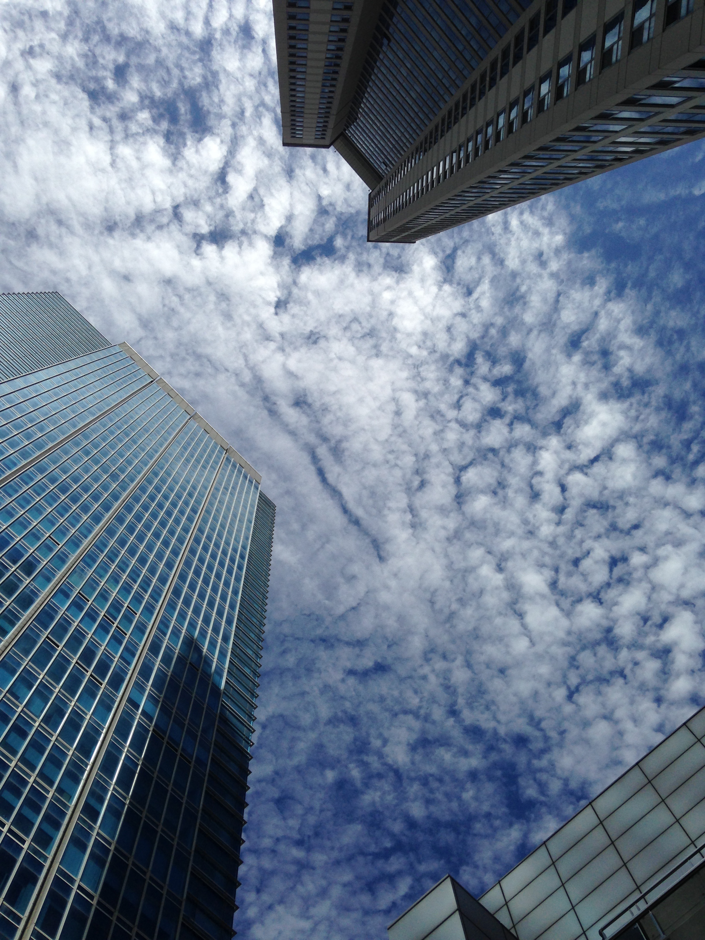 low angle view, modern, songdo, cloud - sky, glass - material, city, tower, 2K, building exterior, no people, outdoors, day, i-phone6, architecture, financial district, Phone HD Wallpaper