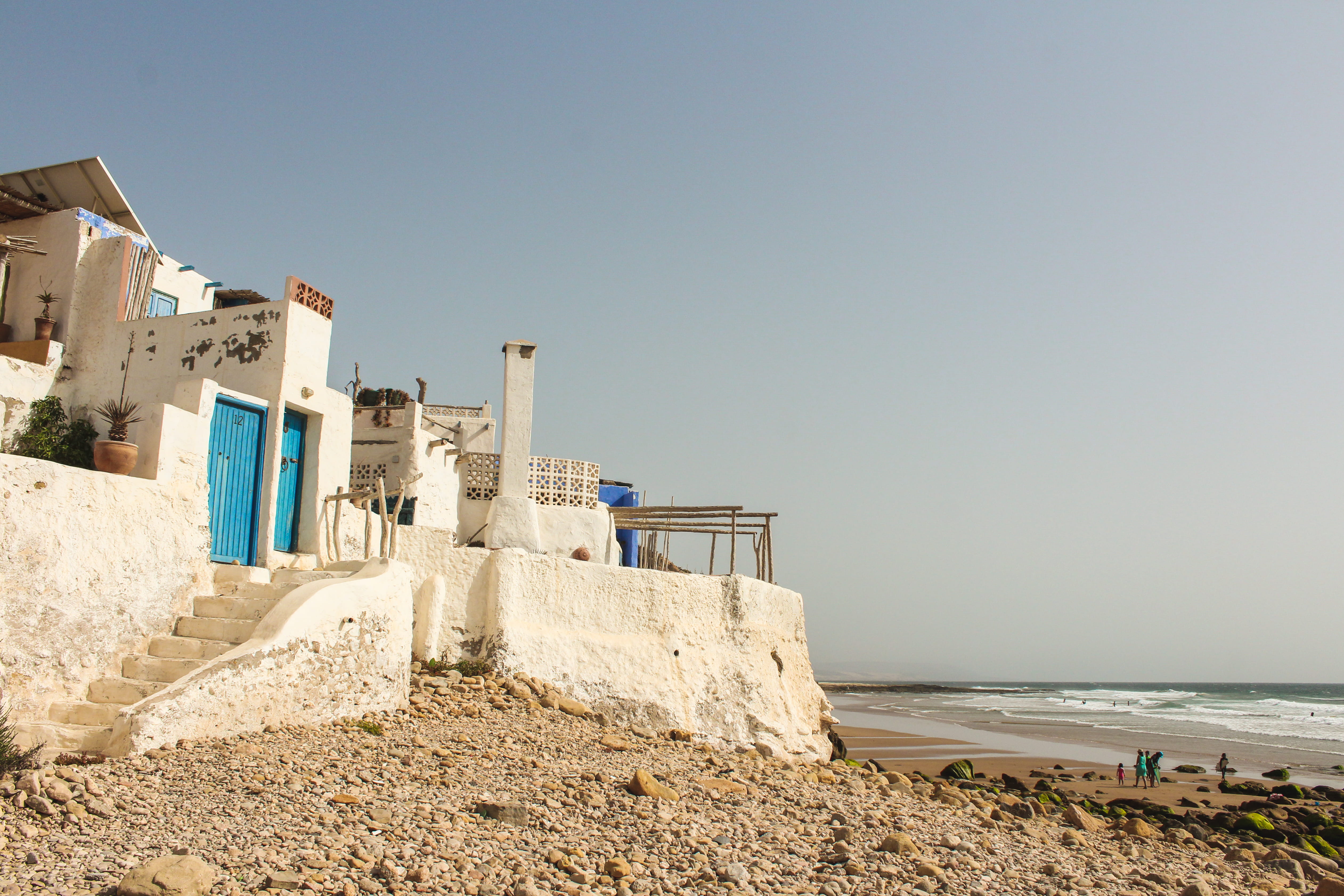concrete, building, sunlight, horizon over water, 4K, daytime, water, white, nature, imsouane, near, architecture, bulldozer, copy space, hut, coast, rural, HD Wallpaper
