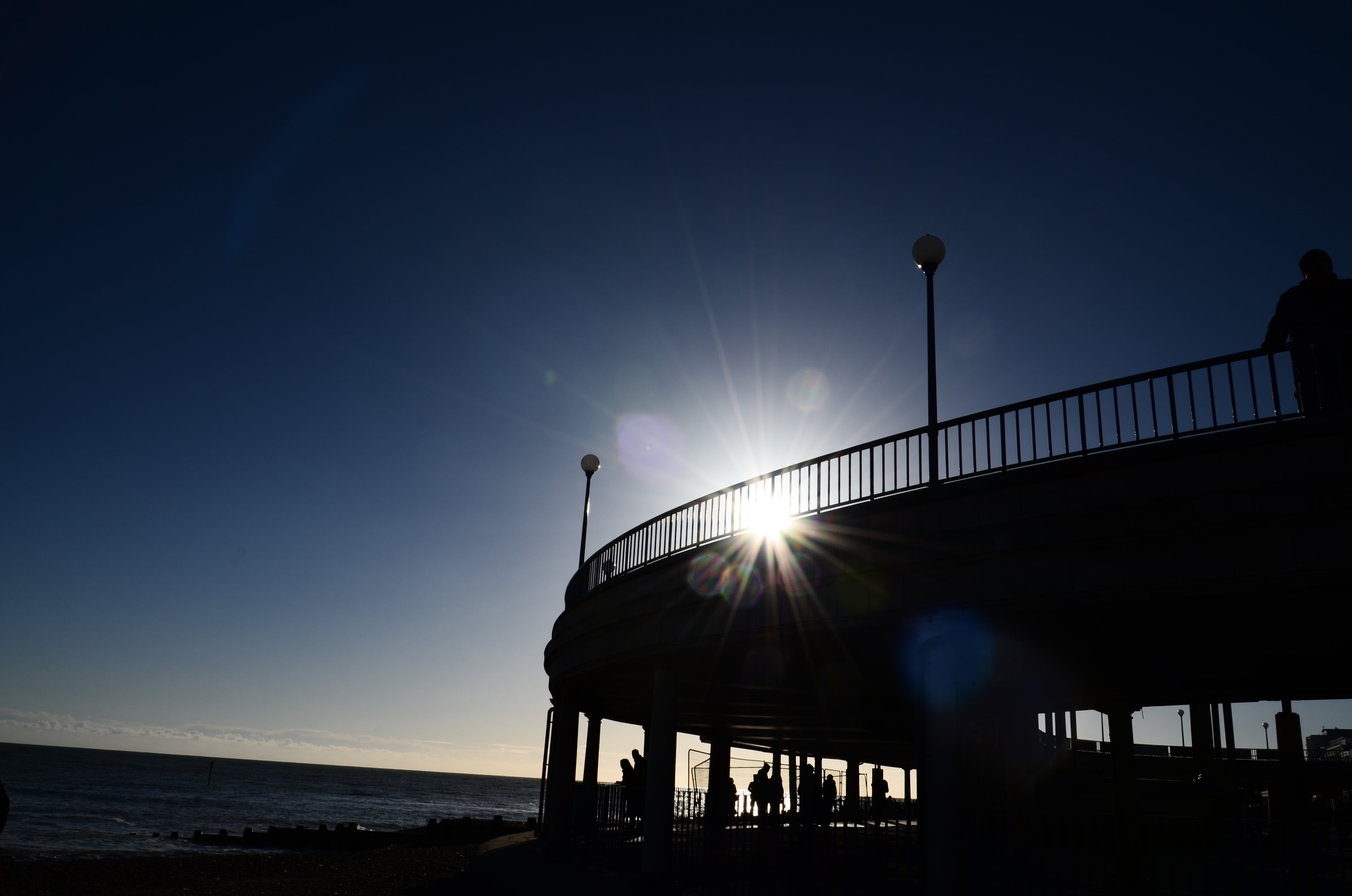 scenic, water, ocean, marine, bridge, pier, outdoors, silhouette, built structure, low angle view, sun, seaside, sunlight, 4K, sunbeam, outdoor, seascape, HD Wallpaper