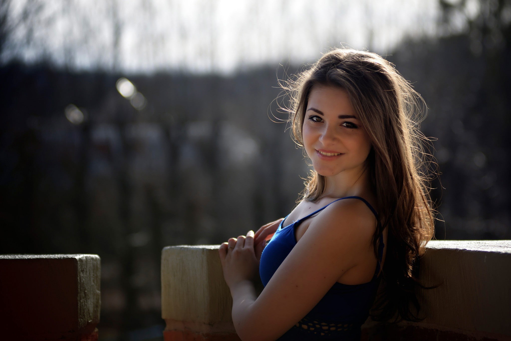 focus on foreground, smiling, model, looking at camera, happiness, beauty, long hair, beautiful woman, 1080P, casual clothing, portrait, one person, sitting, HD Wallpaper