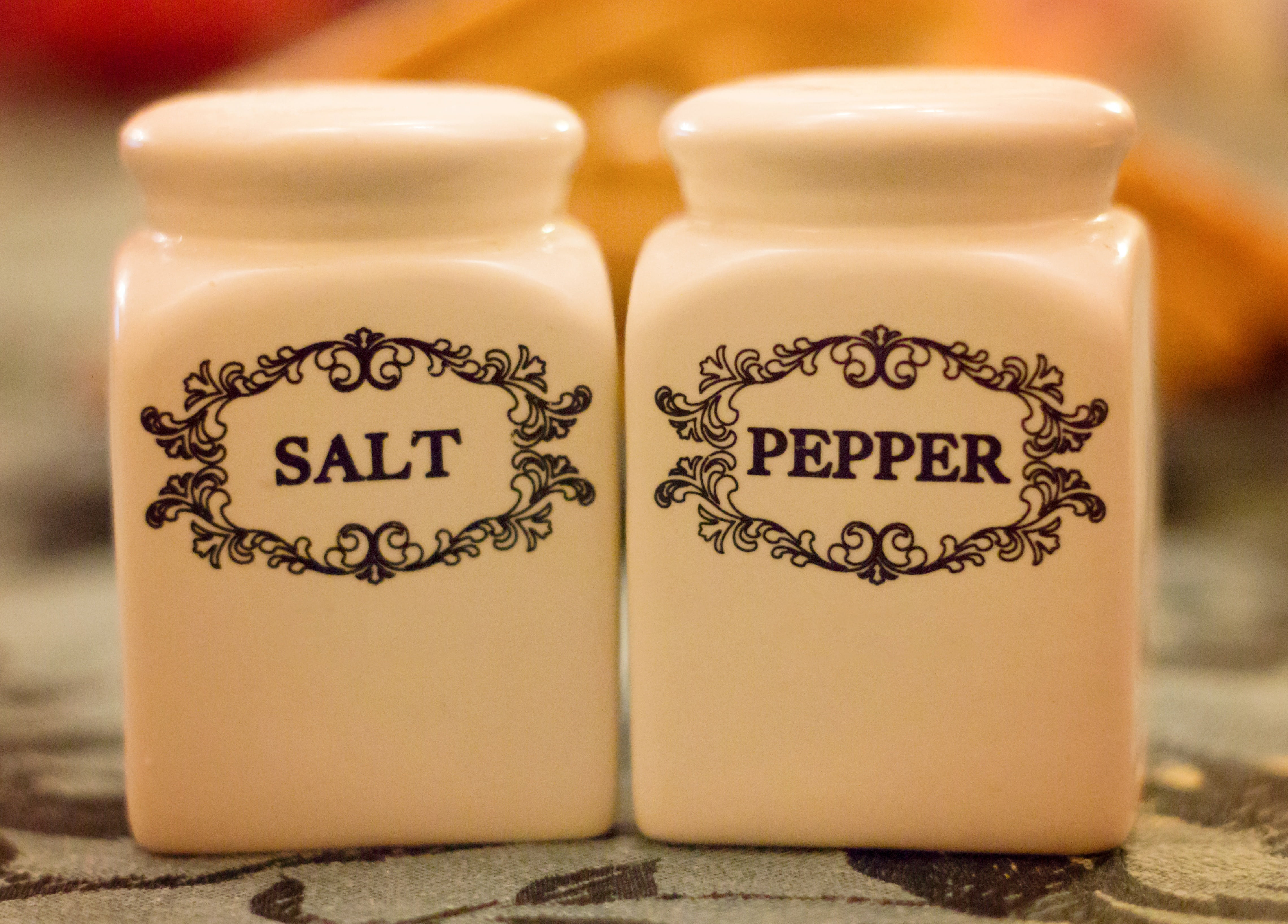 shakers, focus on foreground, cuisine, food, communication, two, spicy, close-up, white, table, refreshment, text, salt, pepper, white color, canisters, HD Wallpaper
