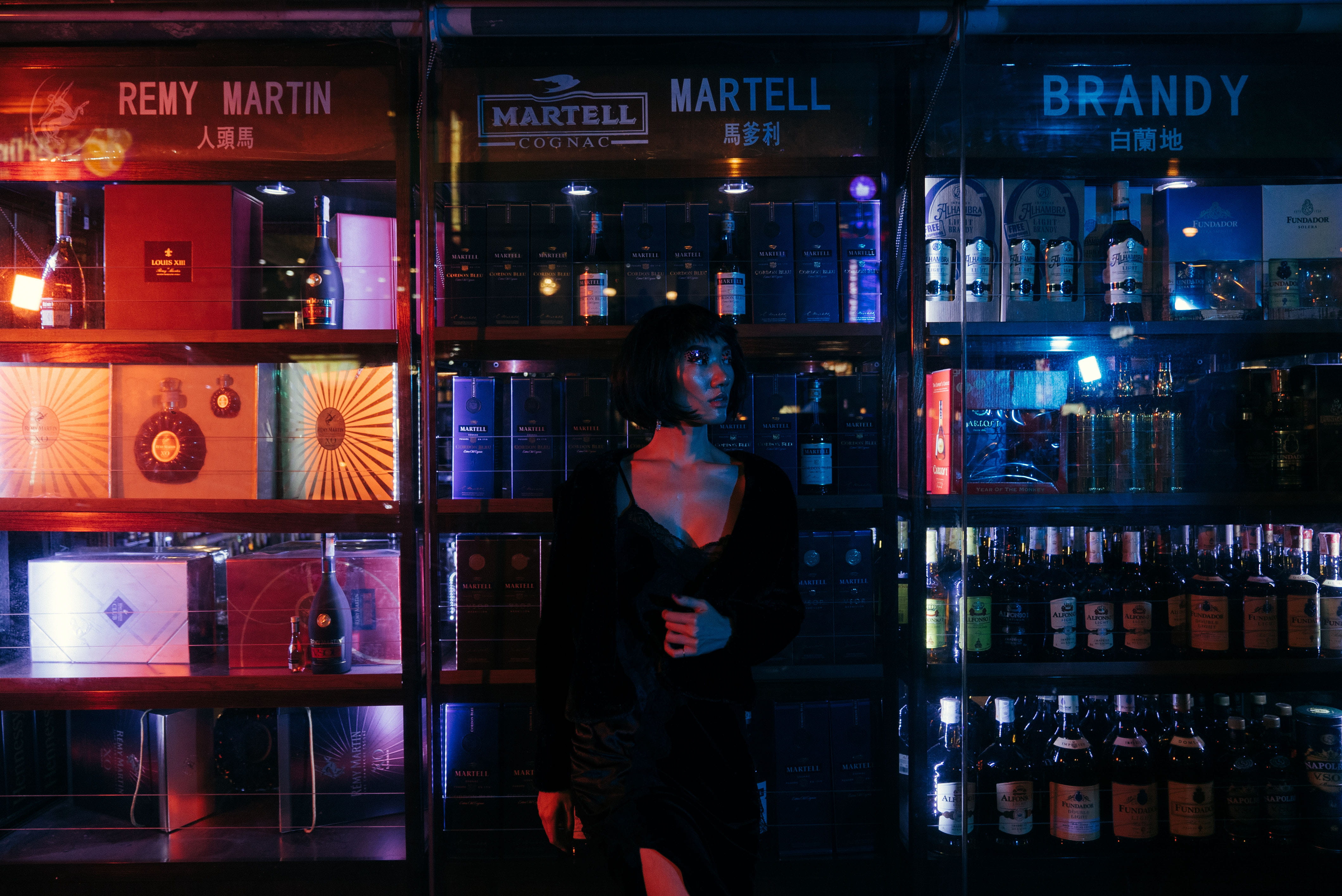 bottle, liquor, lifestyles, city, standing, food and drink, street, neon, sony, art, shelf, store, communication, mirrorless, model, fashion, real people, HD Wallpaper