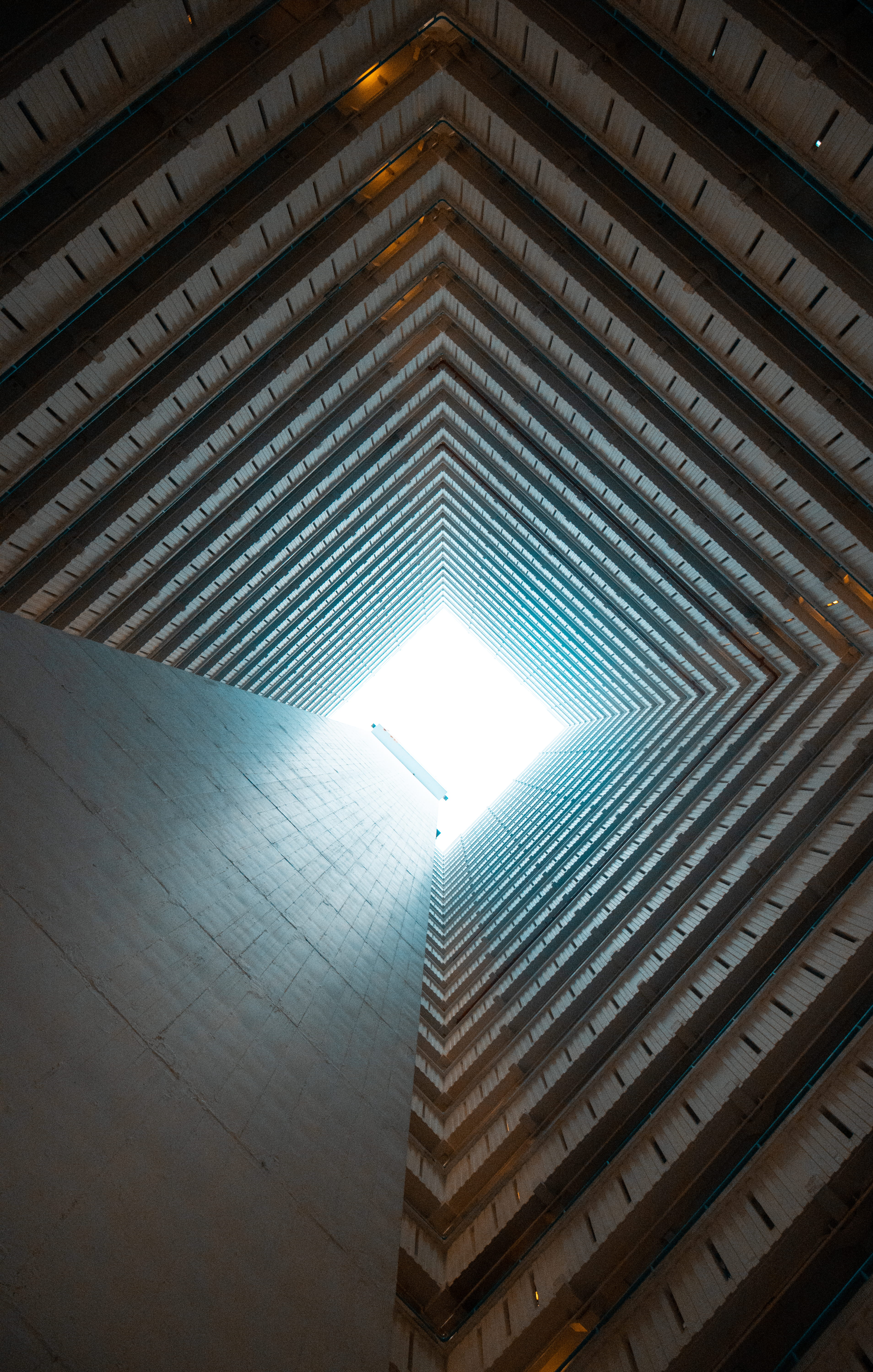 tower, city, shape, tall - high, light at the end of the tunnel, day, hong kong, tunnel, directly below, building, no people, low angle view, repetition, Phone HD Wallpaper