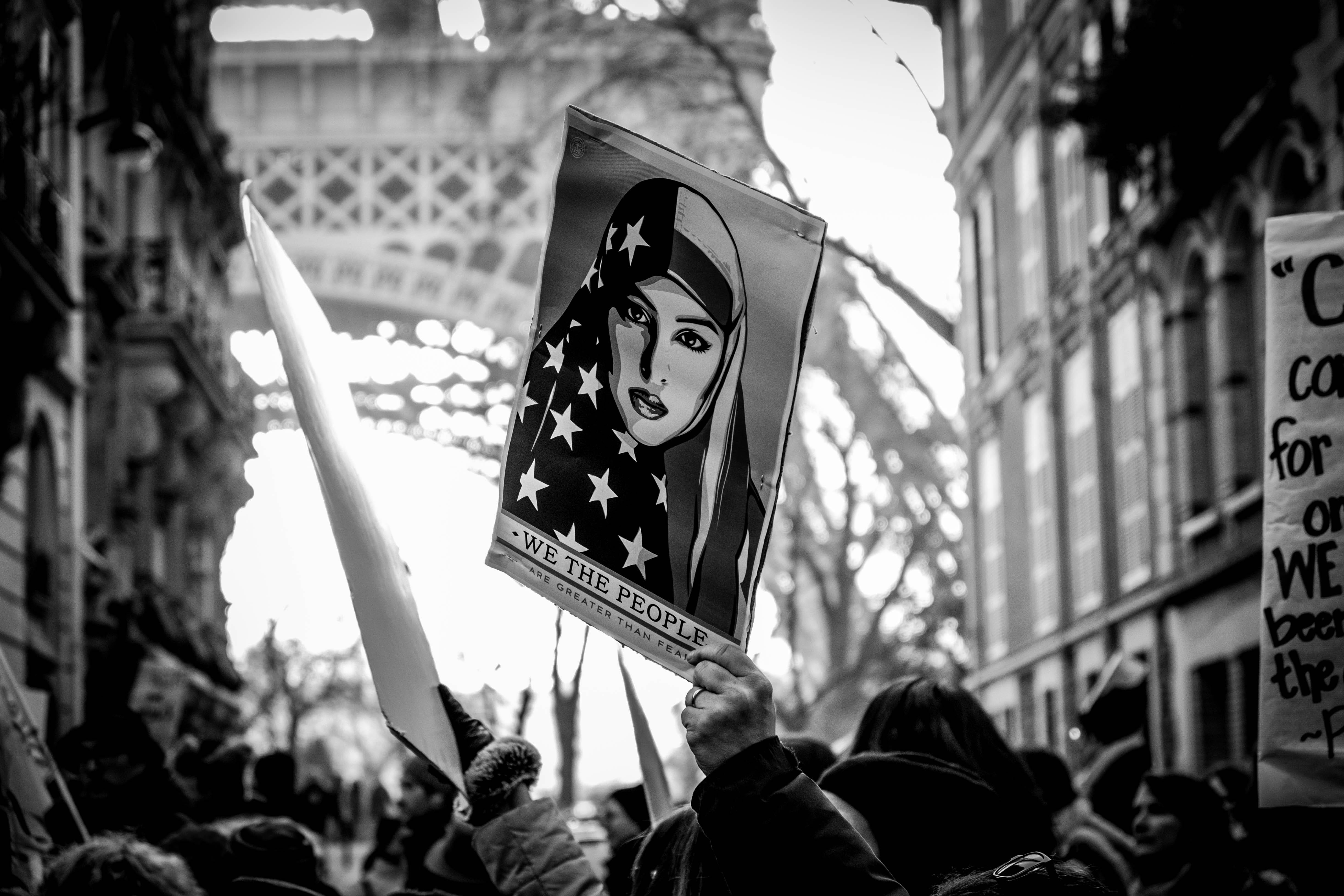 people, sign, group of people, flag, day, men, urban Scene, person, eiffel, holding, grayscale, black And White, focus on foreground, crowd, protest, protestor, HD Wallpaper