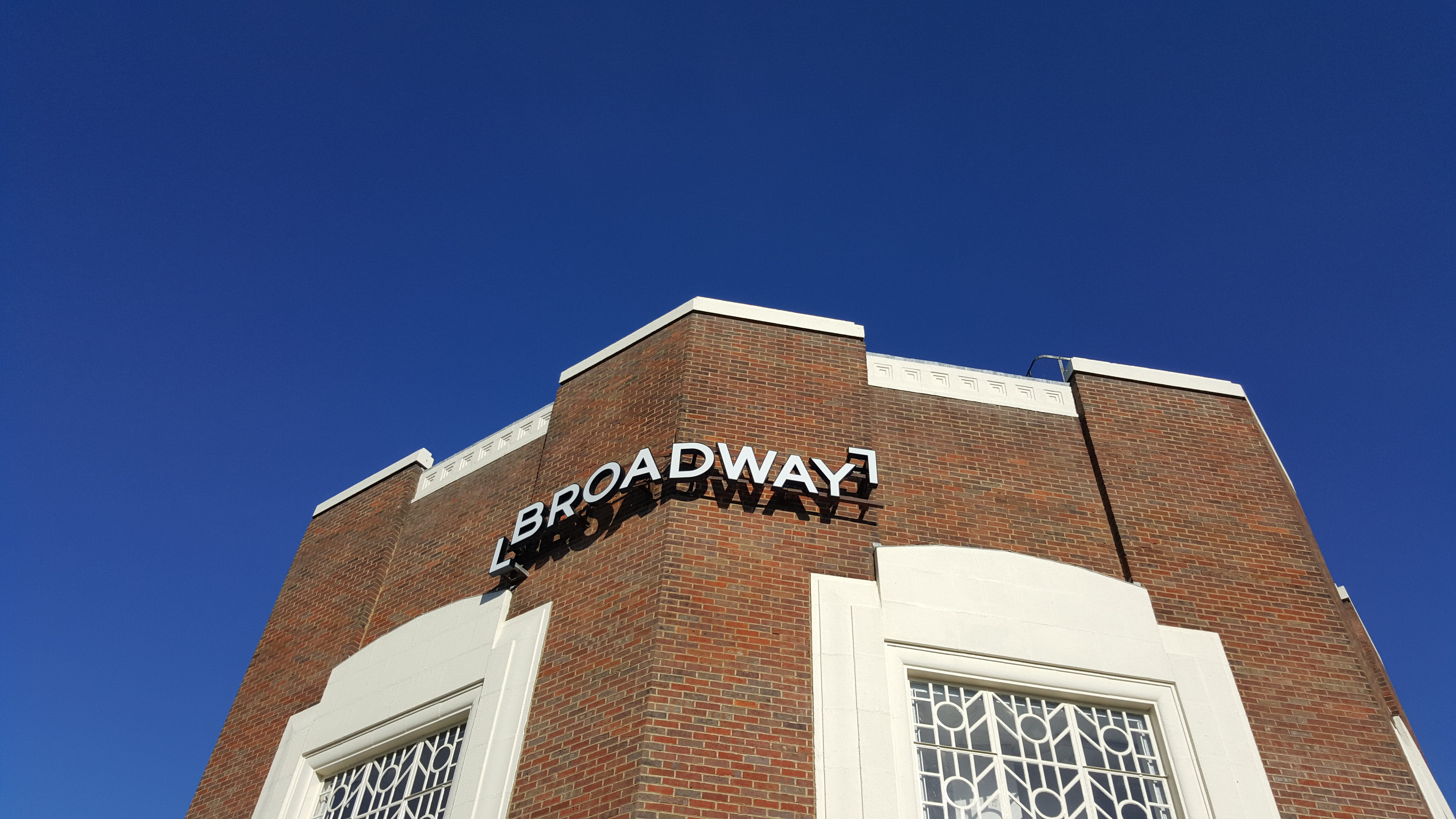 sky, no people, building exterior, day, outdoors, blue, countryside, window, cinema, building, facade, western script, home decor, shelter, text, low angle view, HD Wallpaper