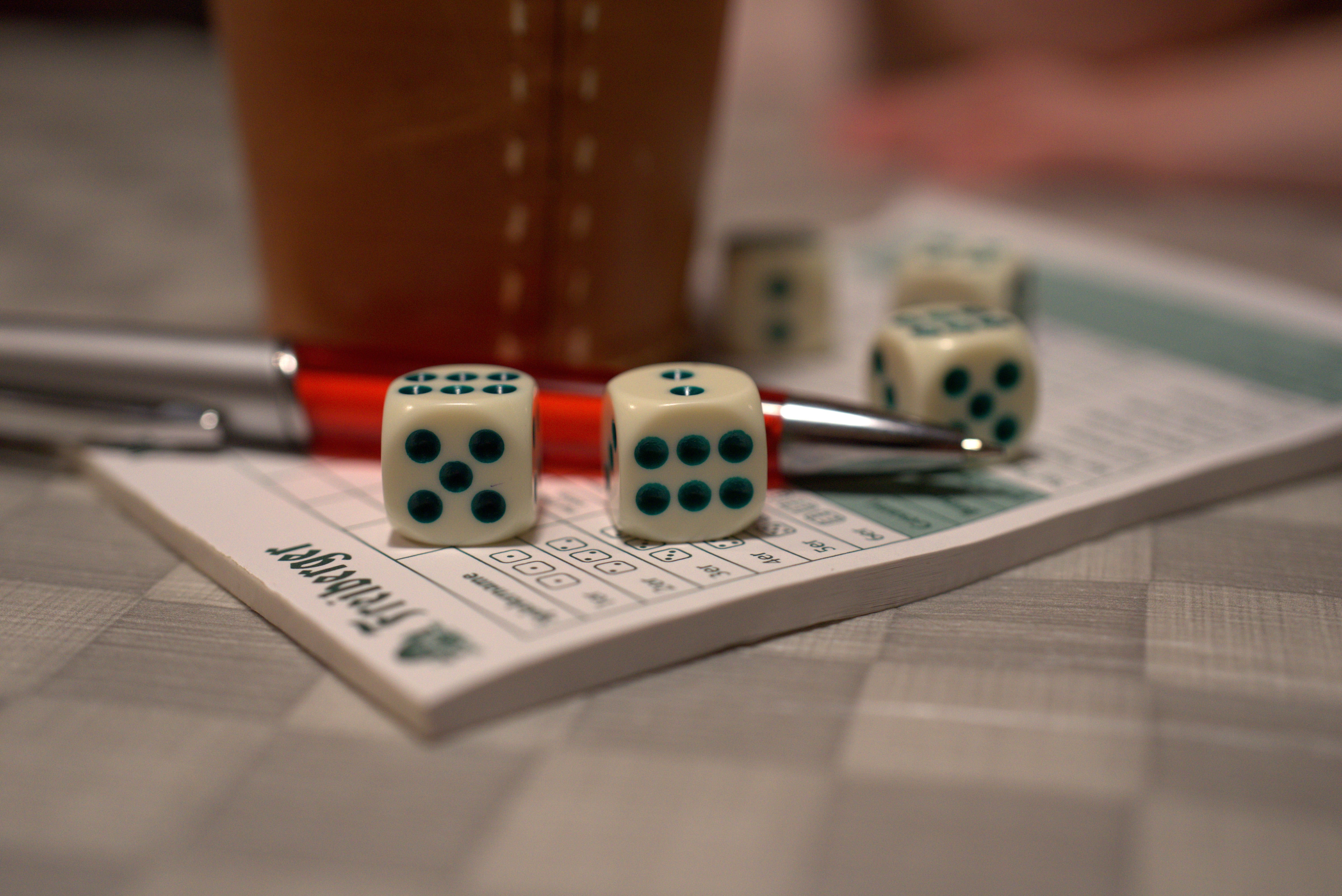 gambling, indoors, risk, focus on foreground, leisure games, 5K, table, game of chance, luck, play, close-up, fun, pen, finance, yatzy, leisure activity, HD Wallpaper