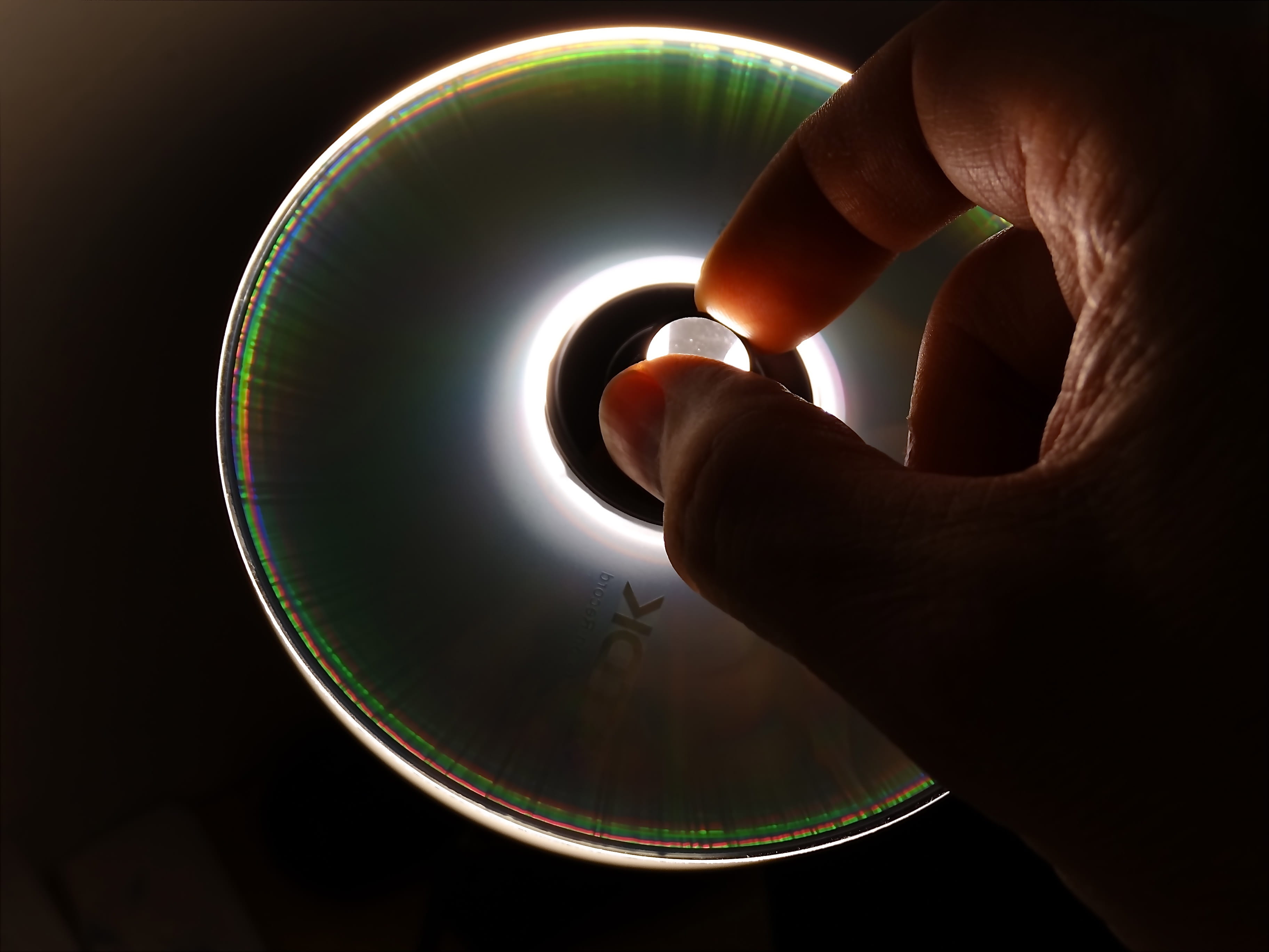 access, black background, adult, cd, computer, human finger, human body part, geometric shape, finger, 2K, hand, studio shot, dvd, lichtspiel, indoors, HD Wallpaper