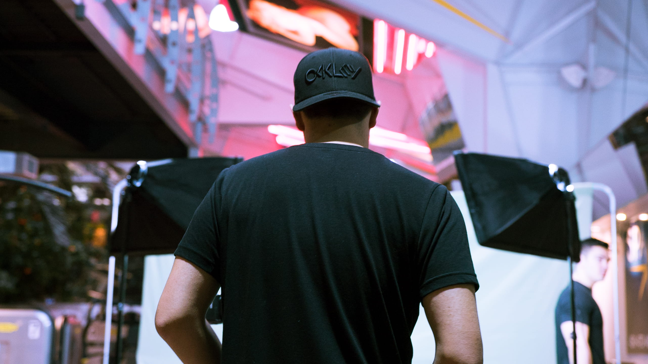 focus on foreground, model, casual clothing, hat, black, green screen, photoshoot, cap, neon sign, one person, portrait, 2K, purple, lights, day, occupation, HD Wallpaper