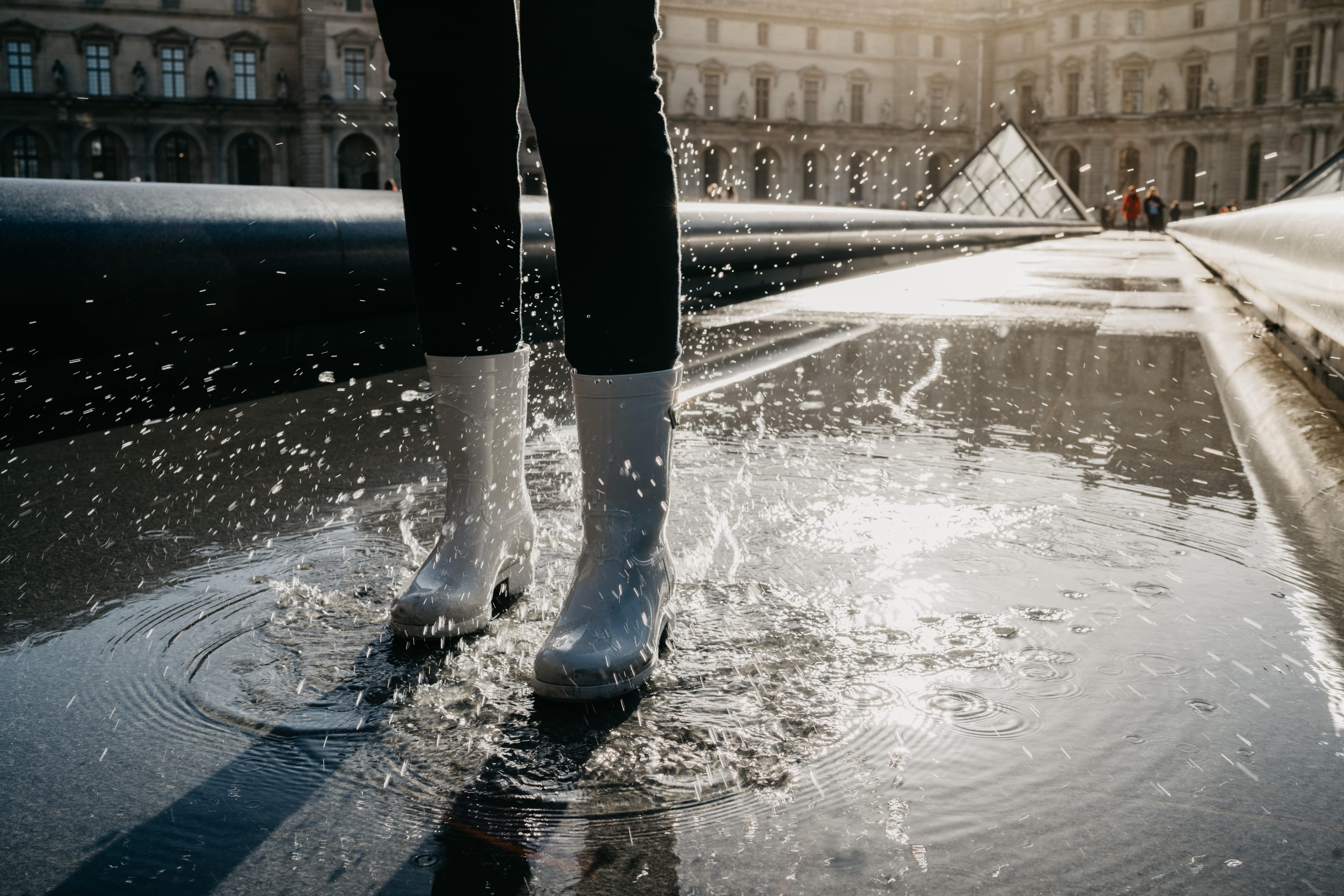 one person, 5K, motion, building exterior, built structure, louvre, splash, clothing, welly, water, outdoors, architecture, day, human leg, shoe, body part, HD Wallpaper