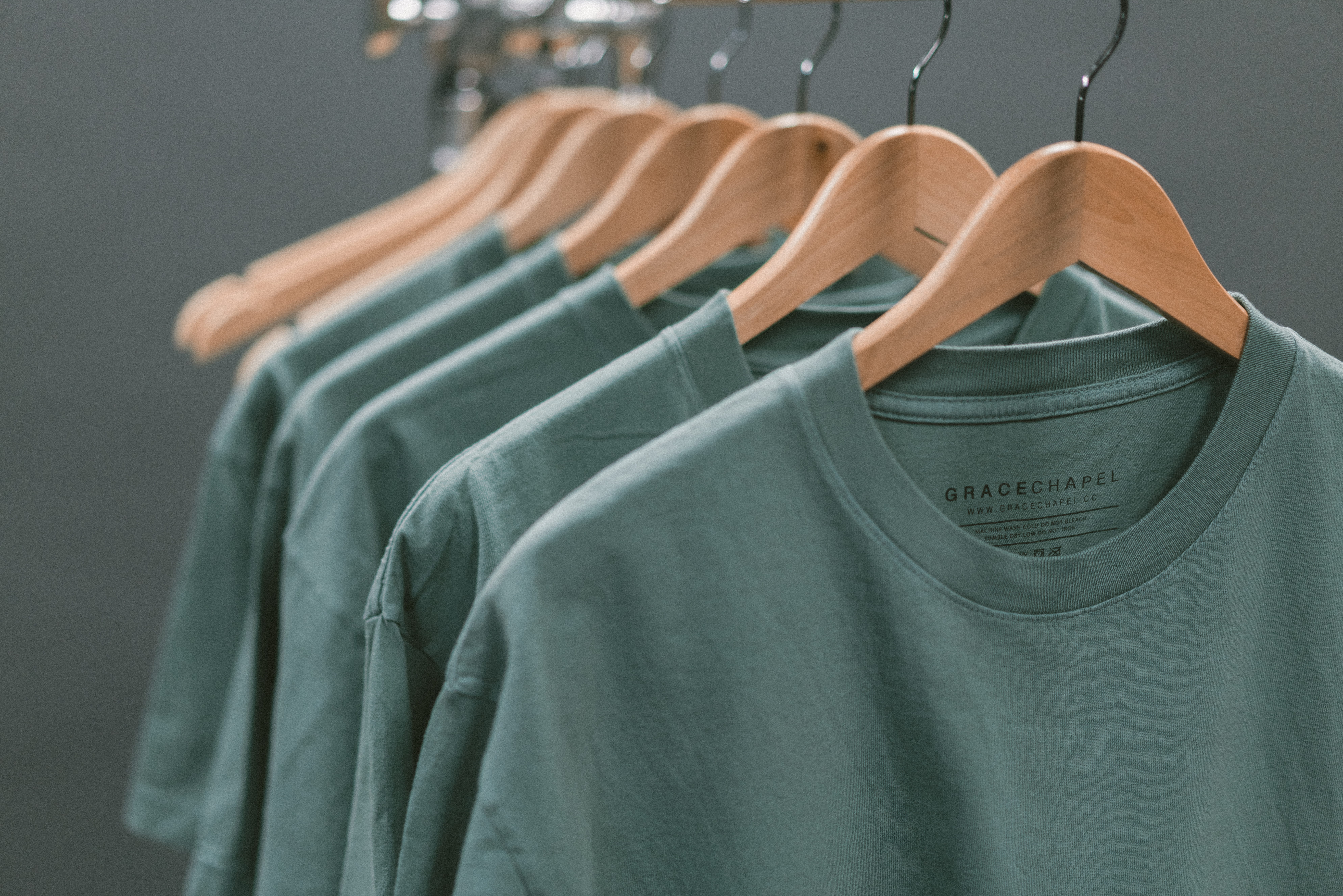 clothes rack, hanging, gray, top - garment, neck, store, clothing, blue, closet, garment, studio shot, furniture, blouse, rack, retail, consumerism, coathanger, HD Wallpaper