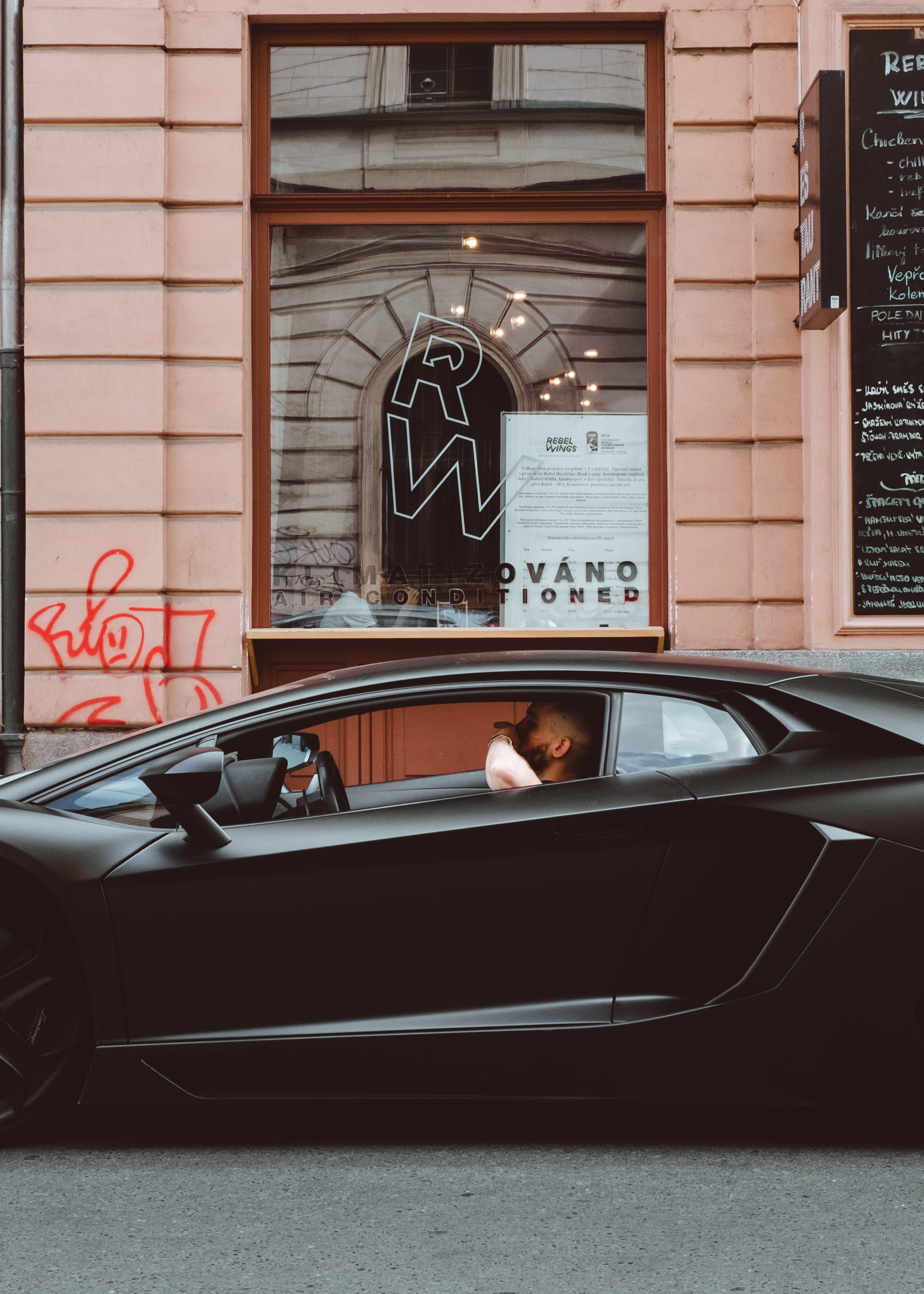 glass, cafe, lamborghini, transportation, arm, beside, beige, restaurant, person, inside, super car, 2K, street, land vehicle, matte, lifestyles, parked, Phone HD Wallpaper