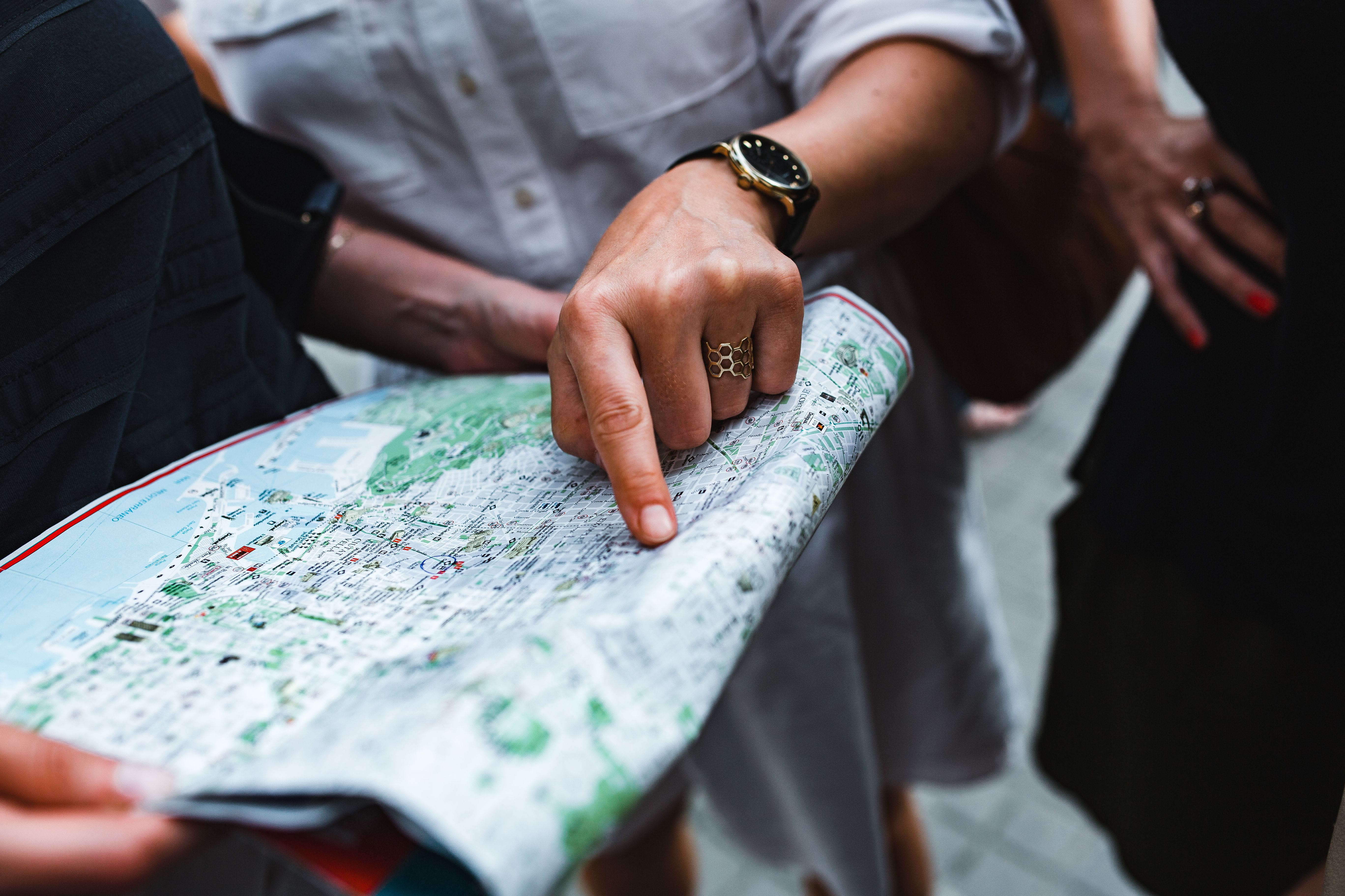 travel, 5K, tour, adult, hike, midsection, holding, human body part, street, only men, real people, direction, sightseeing, guidance, searching, selective focus, HD Wallpaper