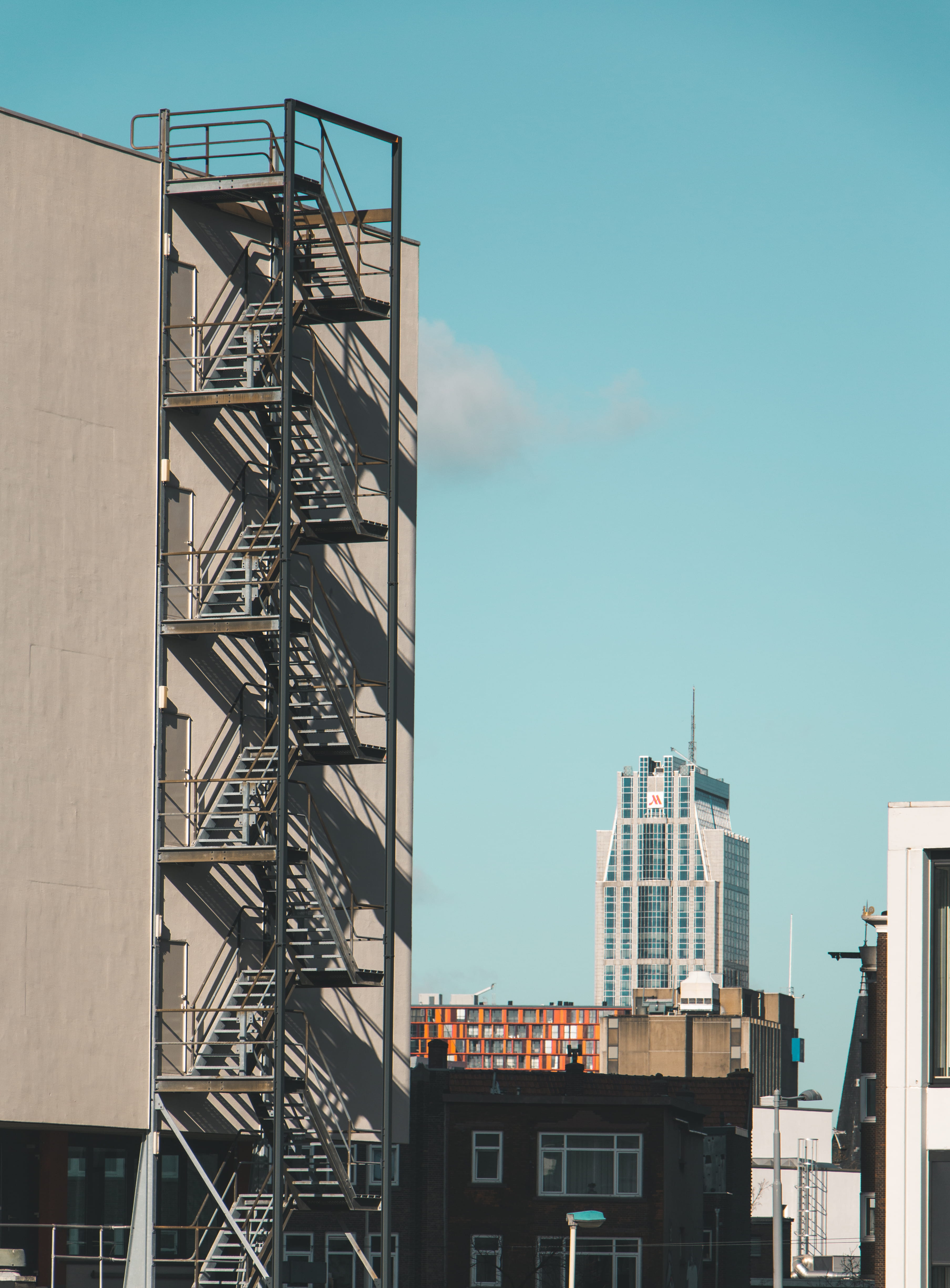 building, sunlight, apartment, railing, architecture, brown, steps and staircases, no people, building exterior, clear sky, daytime, shadow, sky, outdoors, Phone HD Wallpaper