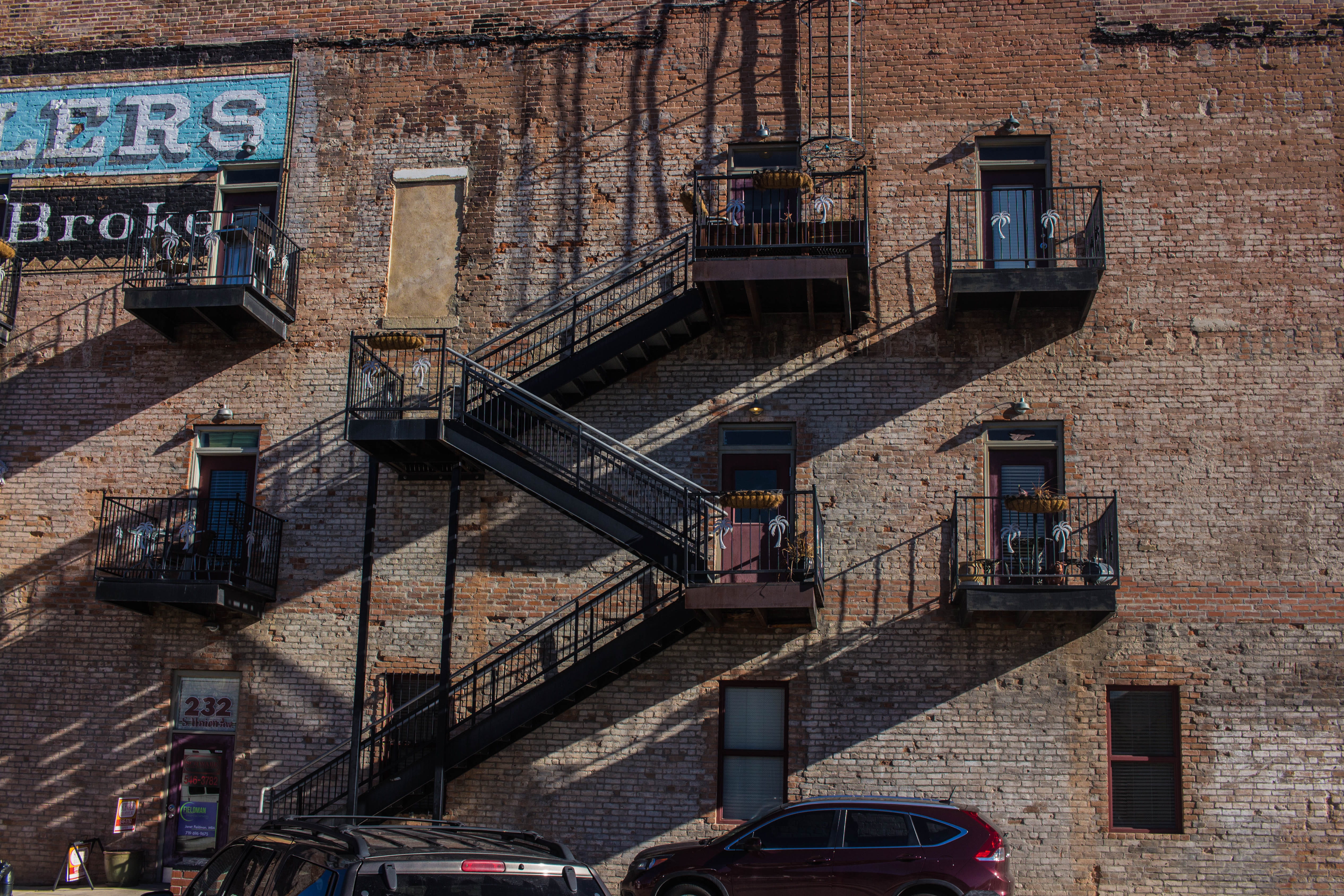 no people, window, outdoors, ladder, brick building, staircase, building exterior, building, residential district, steps and staircases, parked, day, fire escape, HD Wallpaper