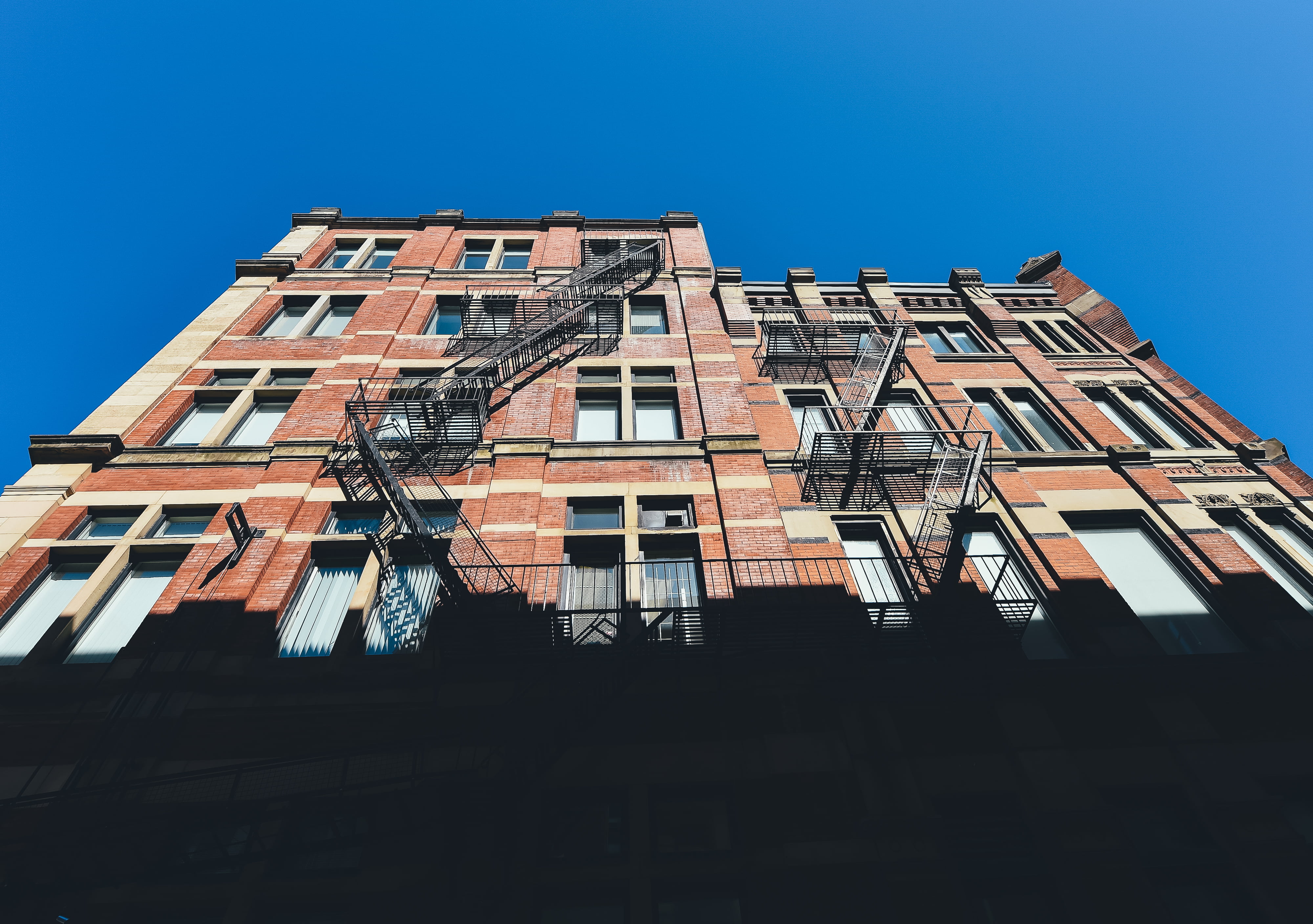 city, 4K, fire escape, staircase, building, low angle view, architecture, built structure, nature, sky, window, no people, high-rise, residential district, HD Wallpaper