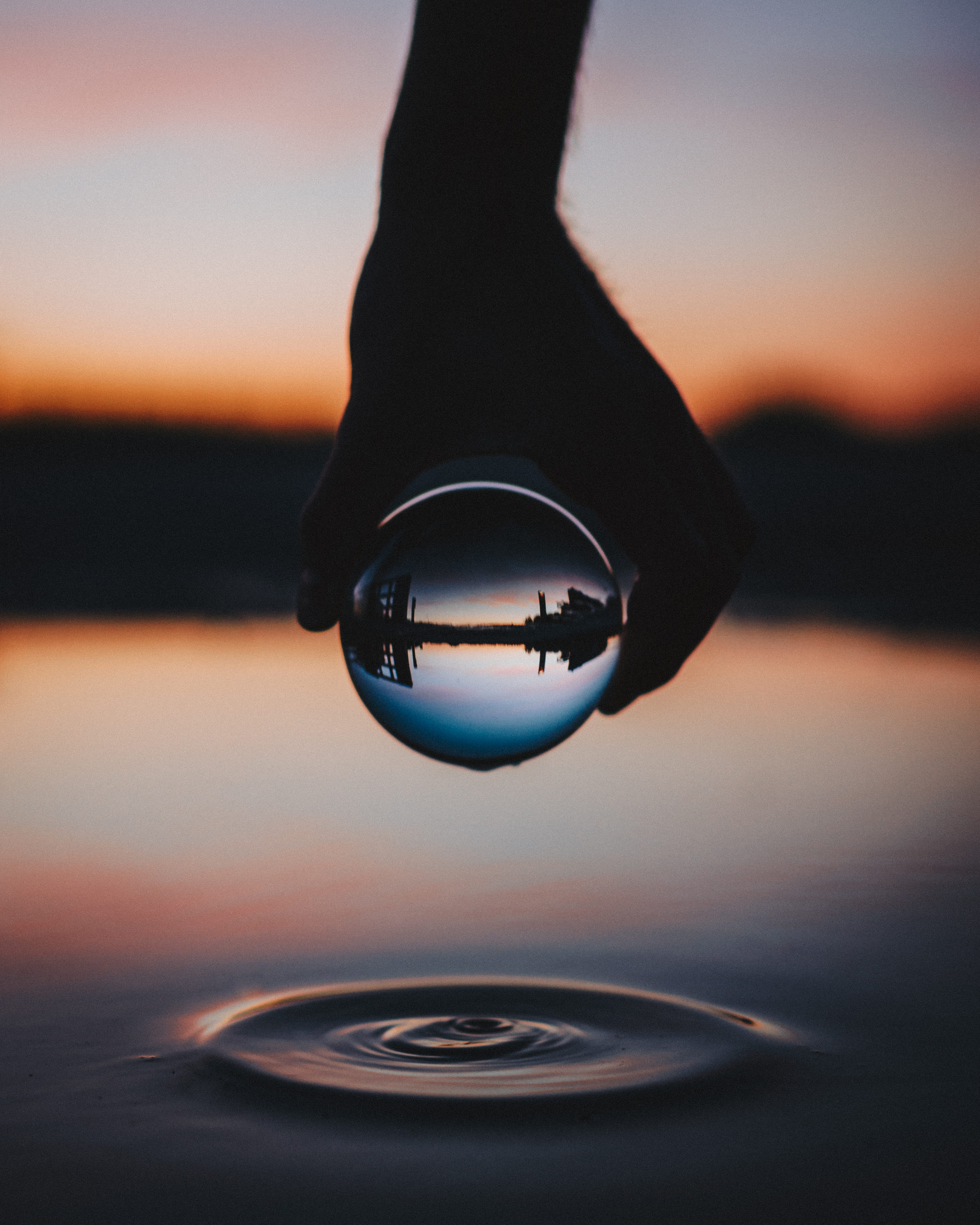 water, blur, transparent, beauty in nature, glass, reflection, glass ball, clear, no people, silhouette, orange color, glass - material, 4K, ball, nature, Phone HD Wallpaper