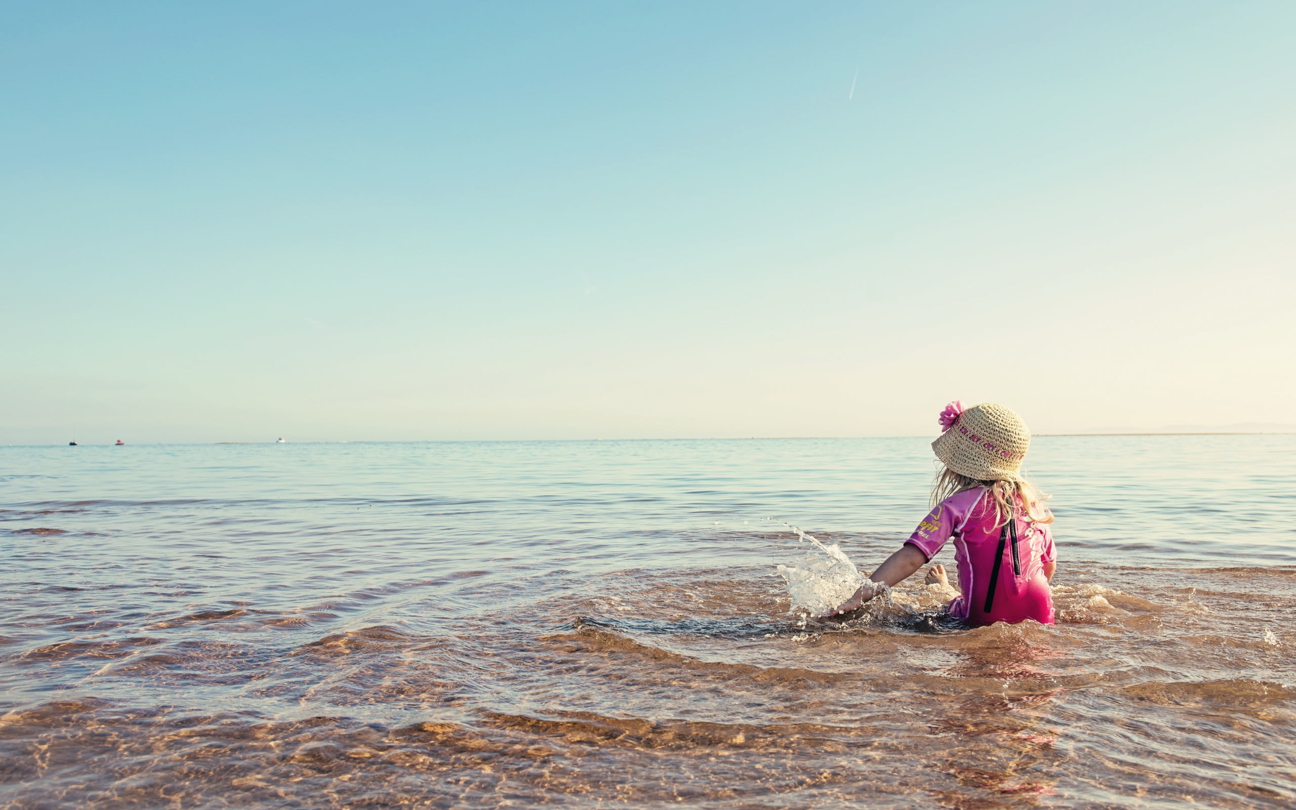 water, sea, playing, horizon over water, land, girls, women, childhood, sky, beach, beauty in nature, 2K, outdoors, real people, clear sky, horizon, child, HD Wallpaper