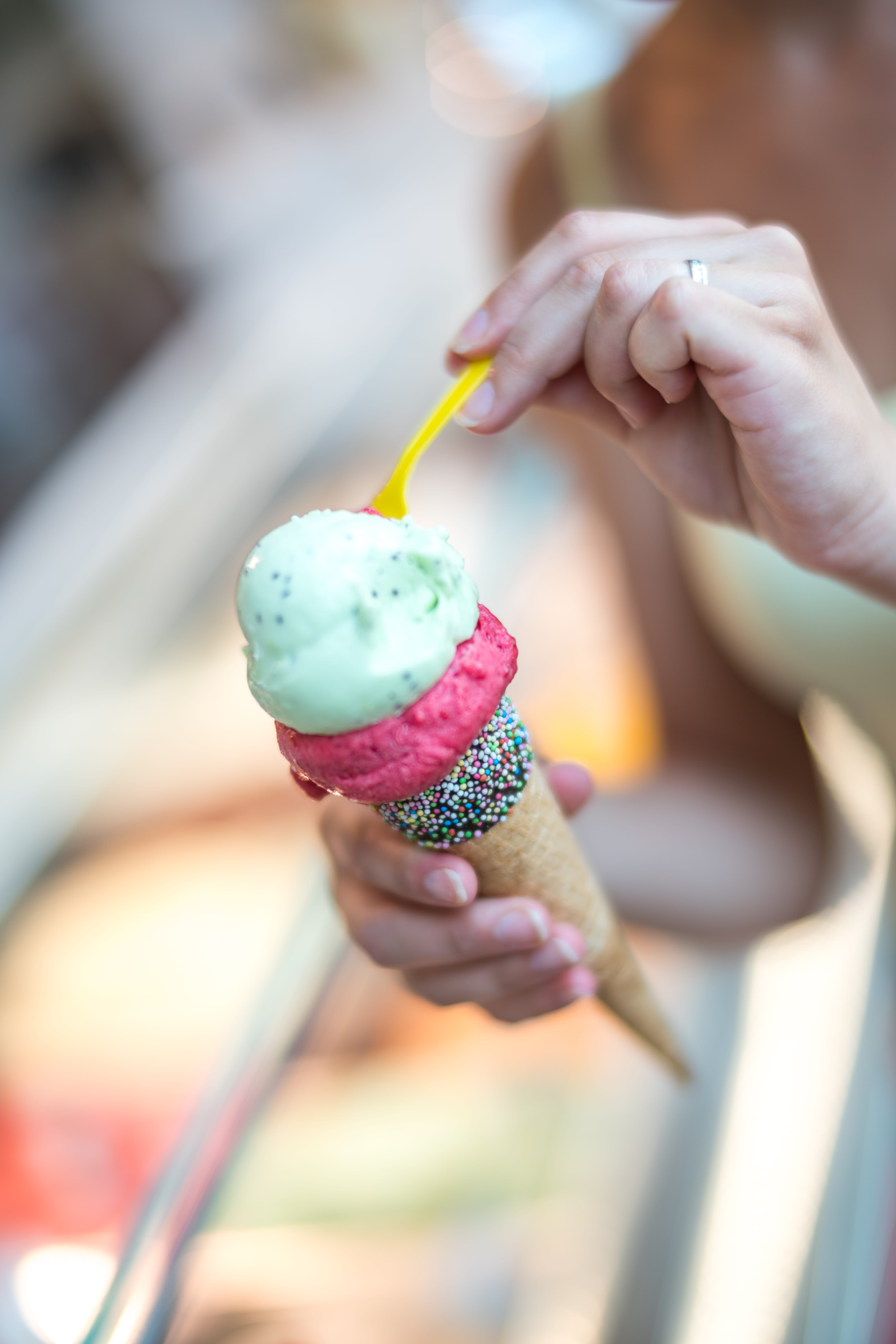 real people, finger, woman, yellow, ice cream, dessert, ice cream cone, temptation, colored, holding, indulgence, food, cone, one person, human hand, unhealthy eating, Phone HD Wallpaper