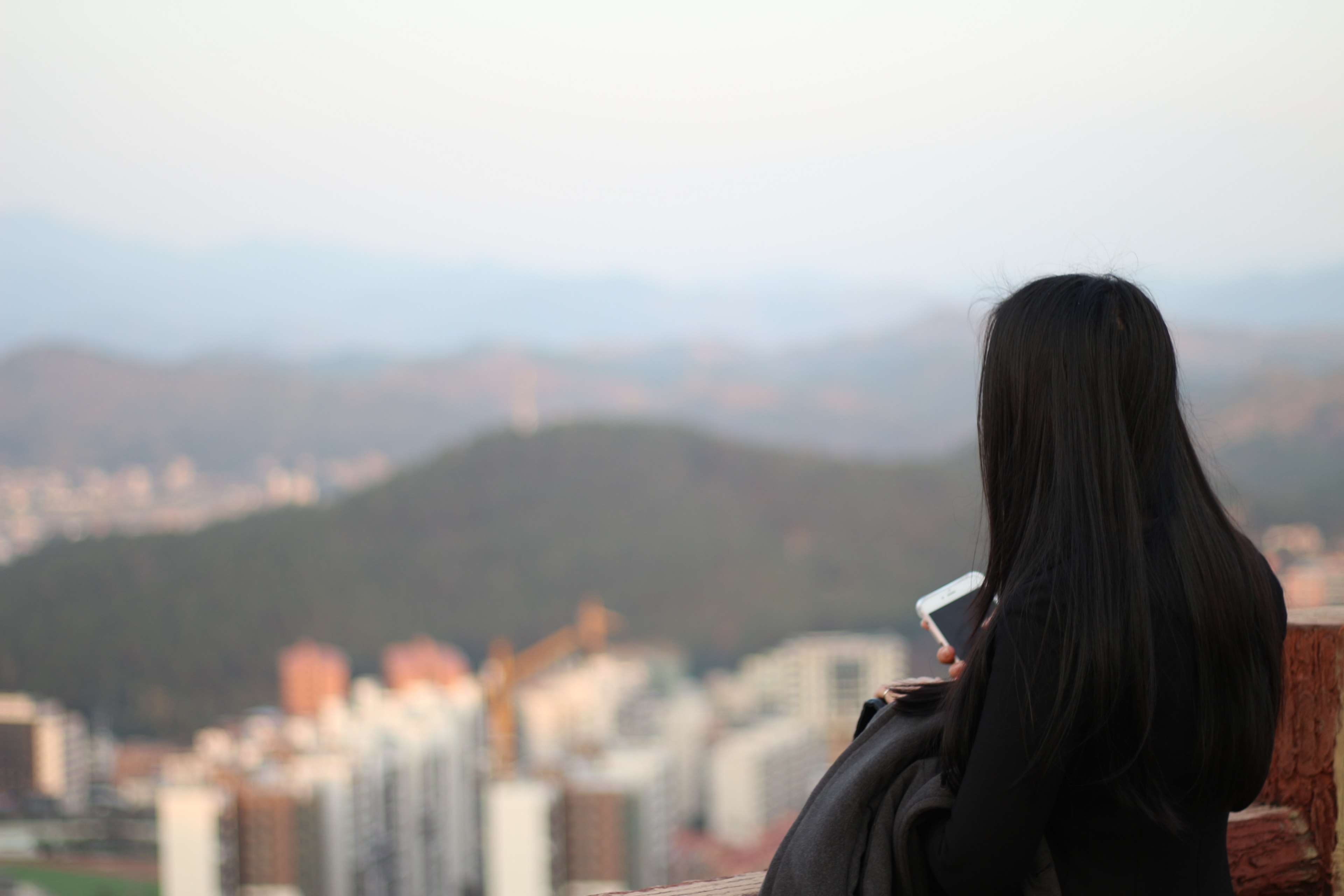 real people, built structure, panorama, focus on foreground, architecture, mountain range, cityscape, lifestyles, headshot, outdoors, woman, hair, royalty, HD Wallpaper