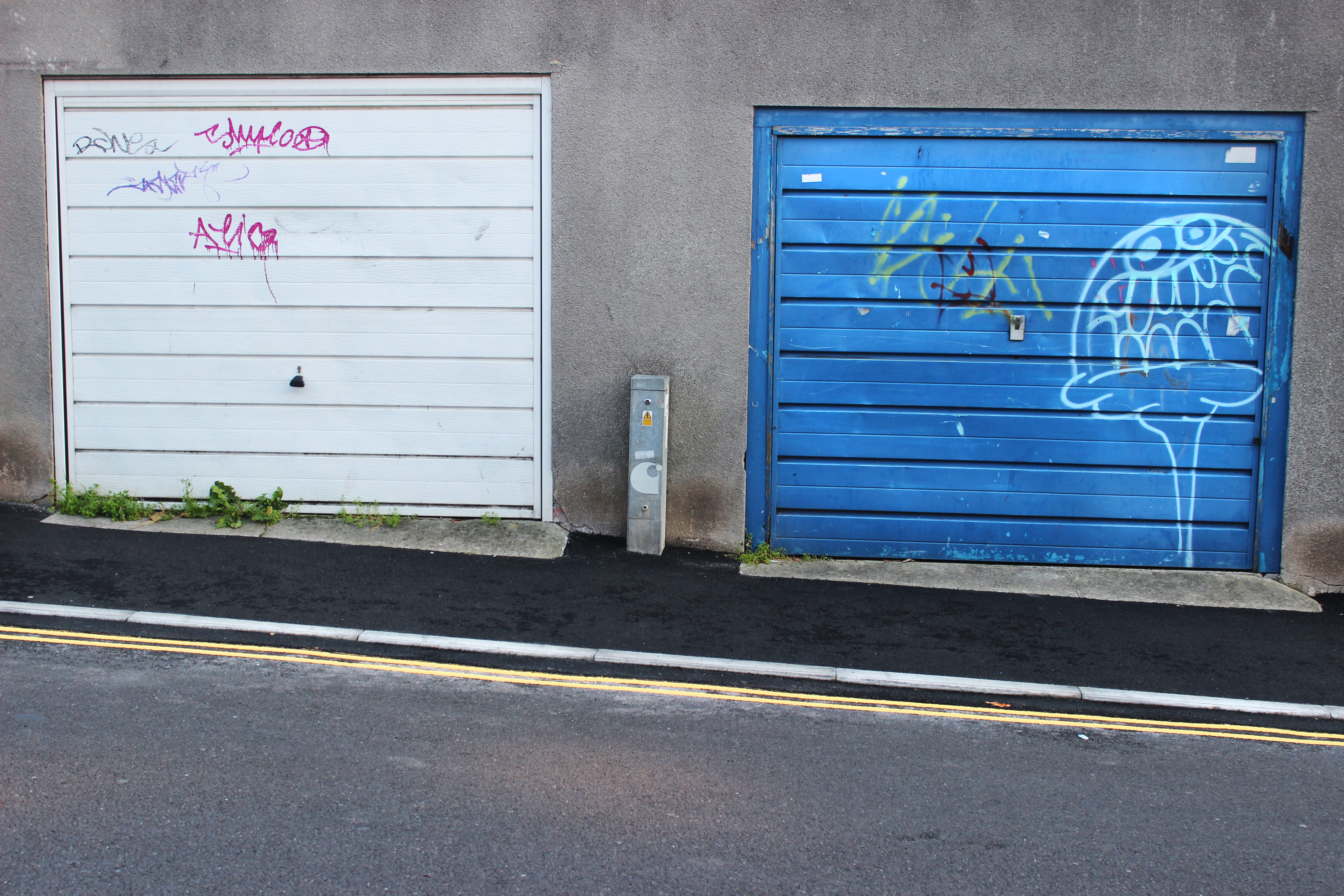 united kingdom, garages, door, doors, no people, pavement, garage, graffiti, symbol, building exterior, blue, day, road, closed, 2K, western script, street, HD Wallpaper