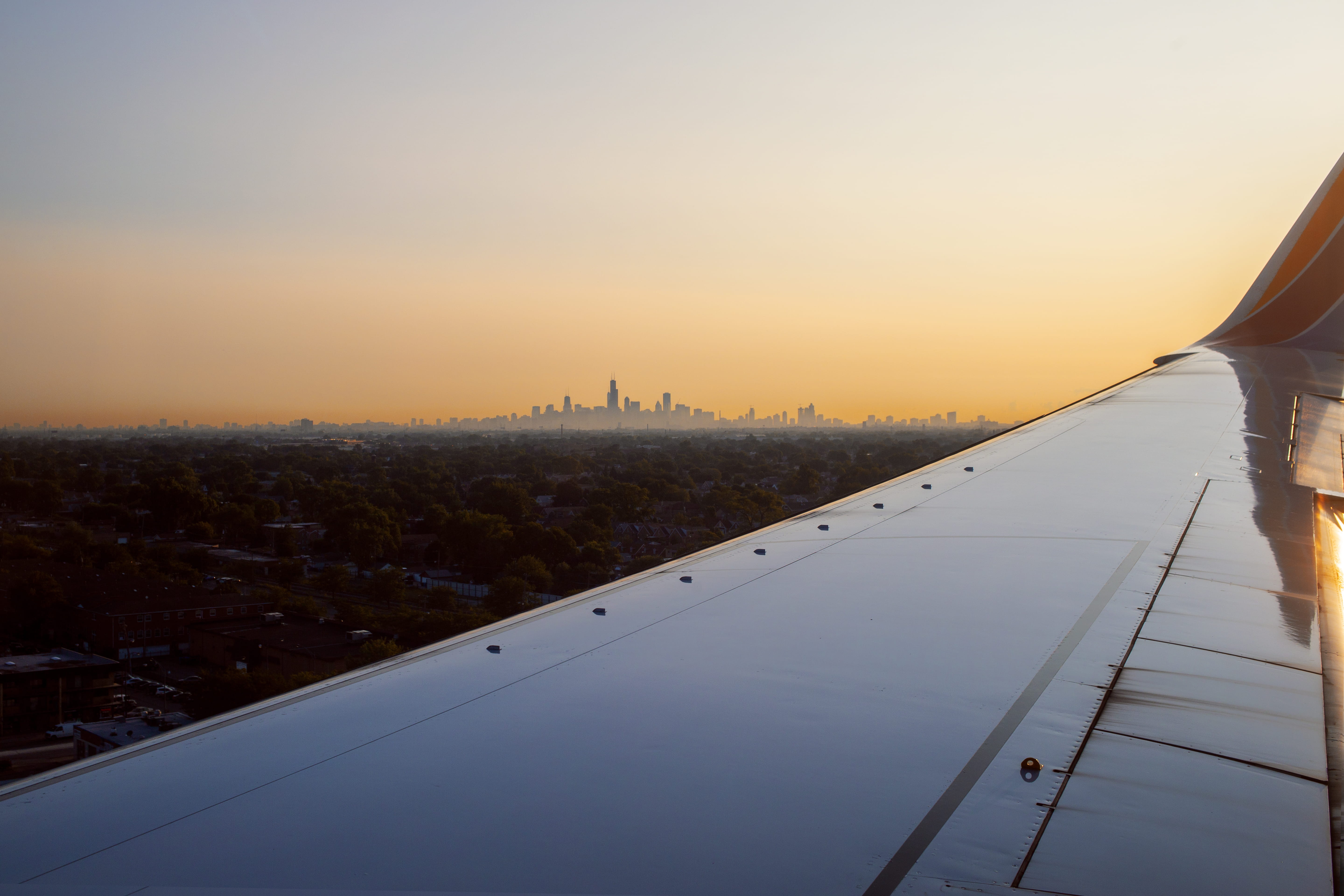 outdoors, skyline, building, sun, city, midway, building exterior, travel destinations, golden hour, plane wing, no people, urban, airplane, windy city, HD Wallpaper