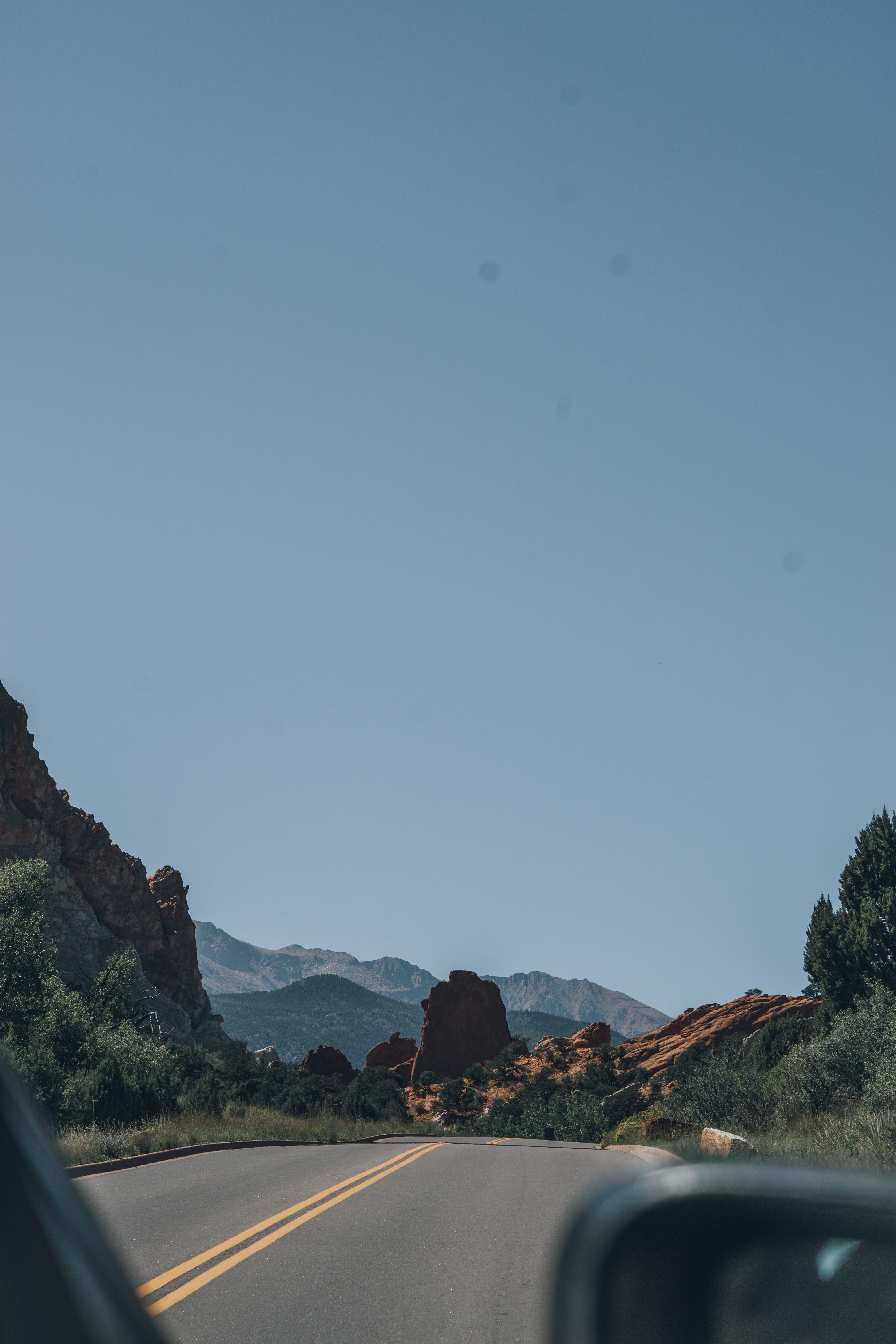 outdoors, sky, trees, clear sky, on the move, colorado, road, open road, garden of the gods road, car, 5K, road trip, the way forward, car point of view, Phone HD Wallpaper