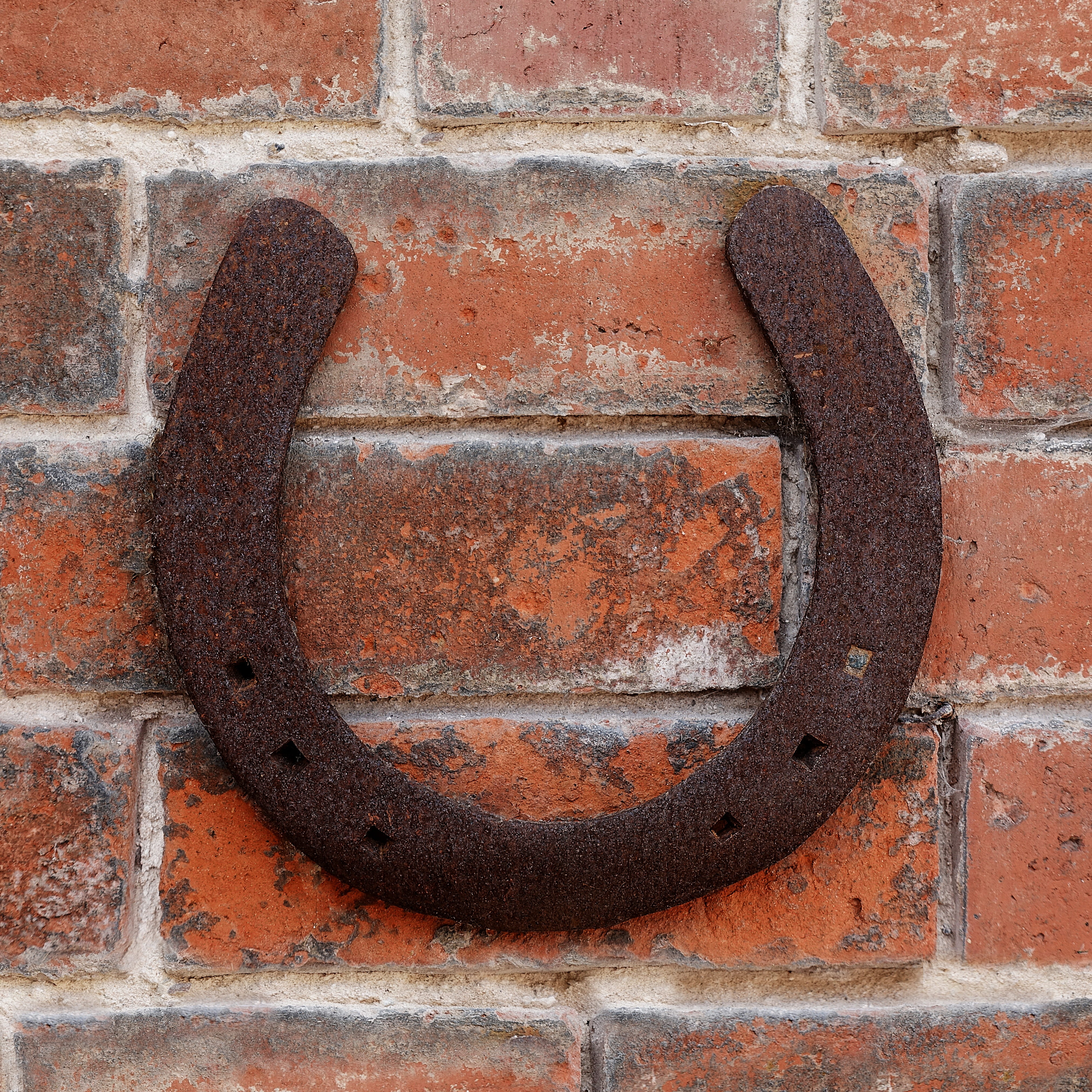 horse, blacksmith, pattern, wall, horseshoe, full frame, happiness, close-up, weathered, course, old, symbol, brick, smithy, built structure, brick wall, Phone HD Wallpaper