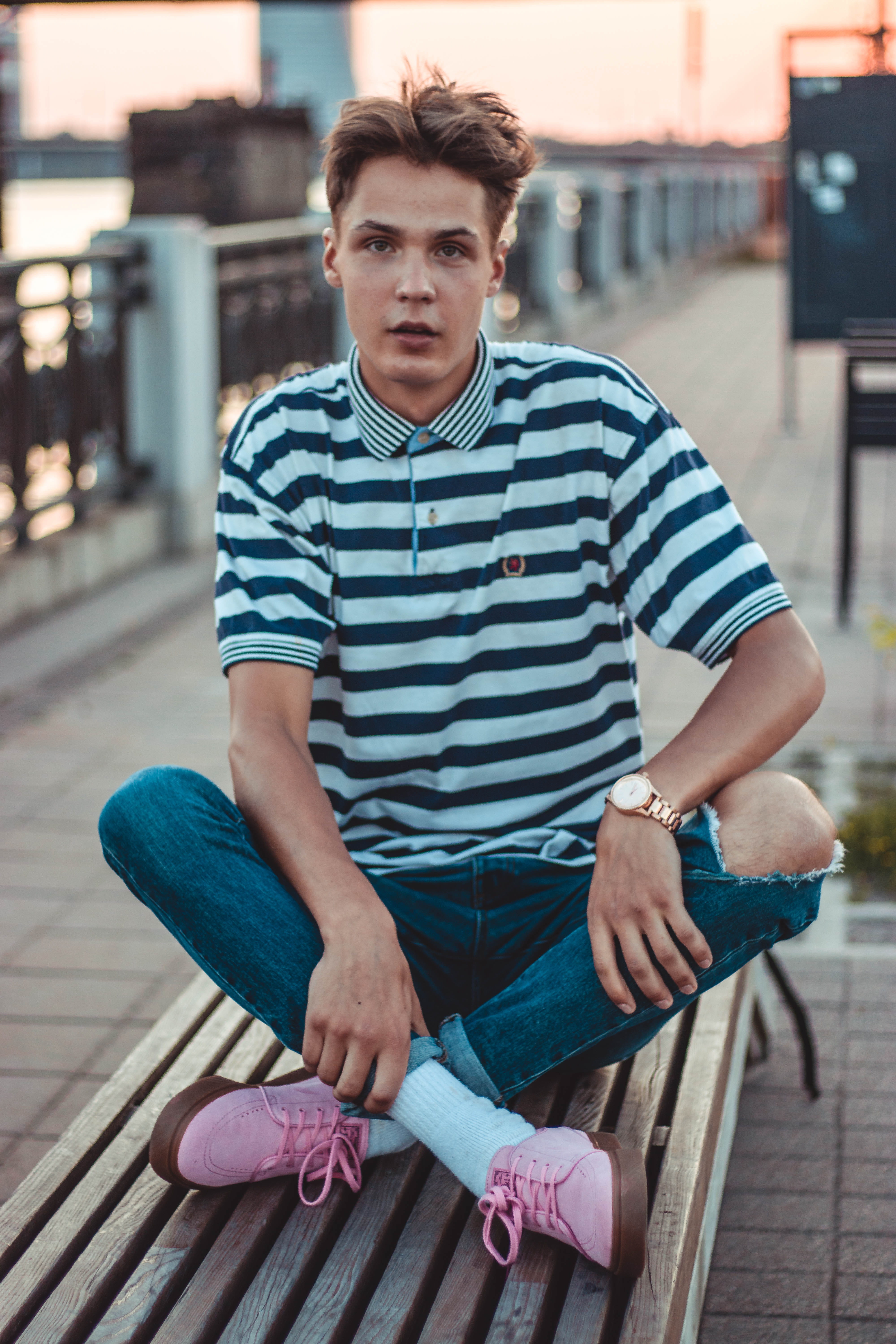 leisure activity, black, pier, casual clothing, outdoors, day, man, bench, architecture, relaxation, shirt, striped, people, real people, young adult, polo, Phone HD Wallpaper