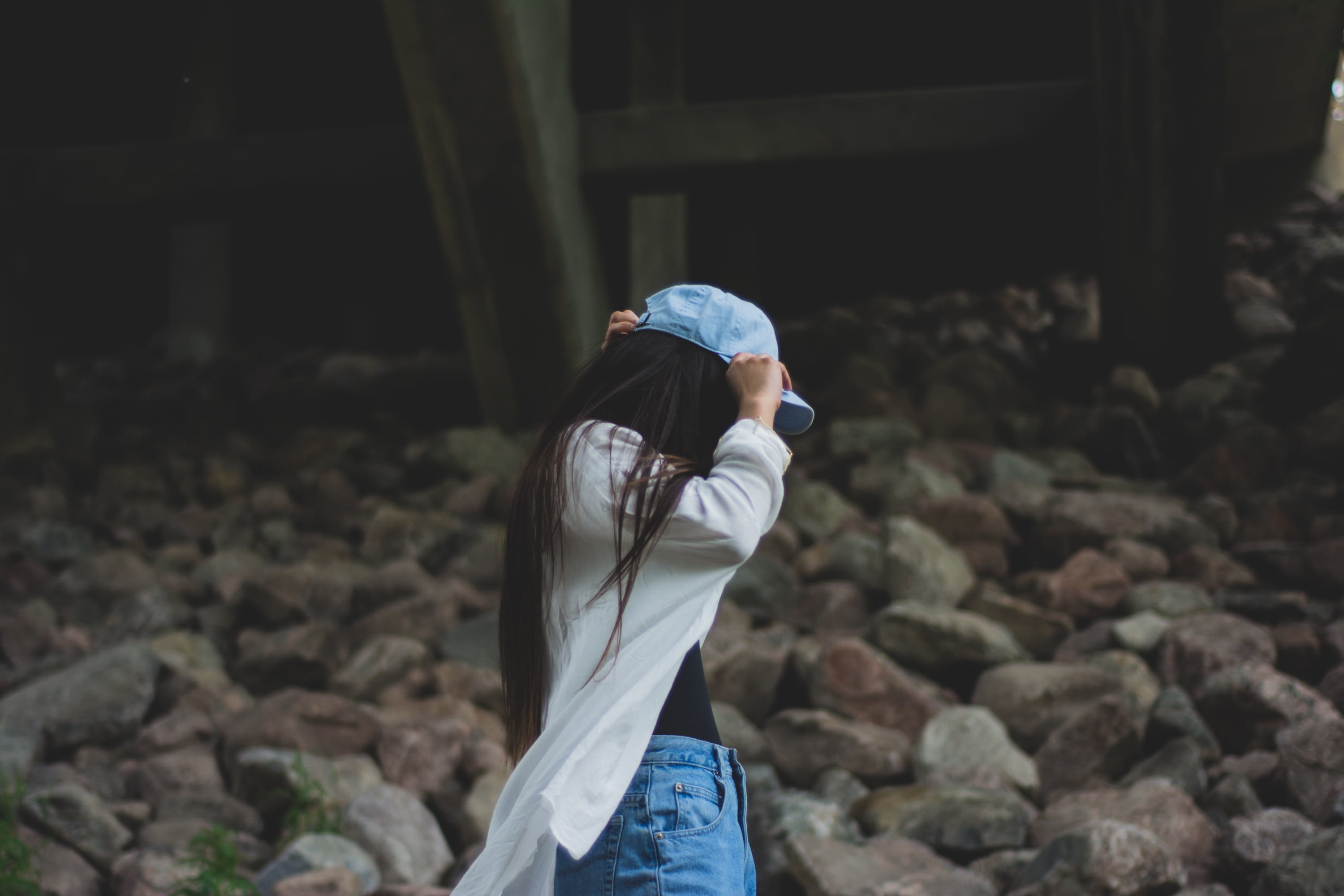 young women, leisure activity, lifestyle, person, day, adult, young, women, cardigan, girl, rear view, cap, standing, blue, jeans, takinf off, headgear, HD Wallpaper