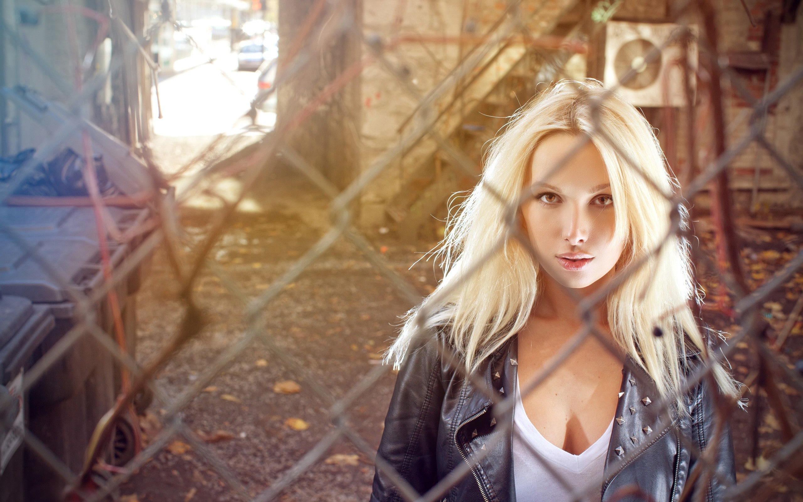 front view, leather jackets, lifestyles, long hair, young adult, hairstyle, teenager, adult, outdoors, day, beauty, blonde, 2K, looking at camera, one person, HD Wallpaper