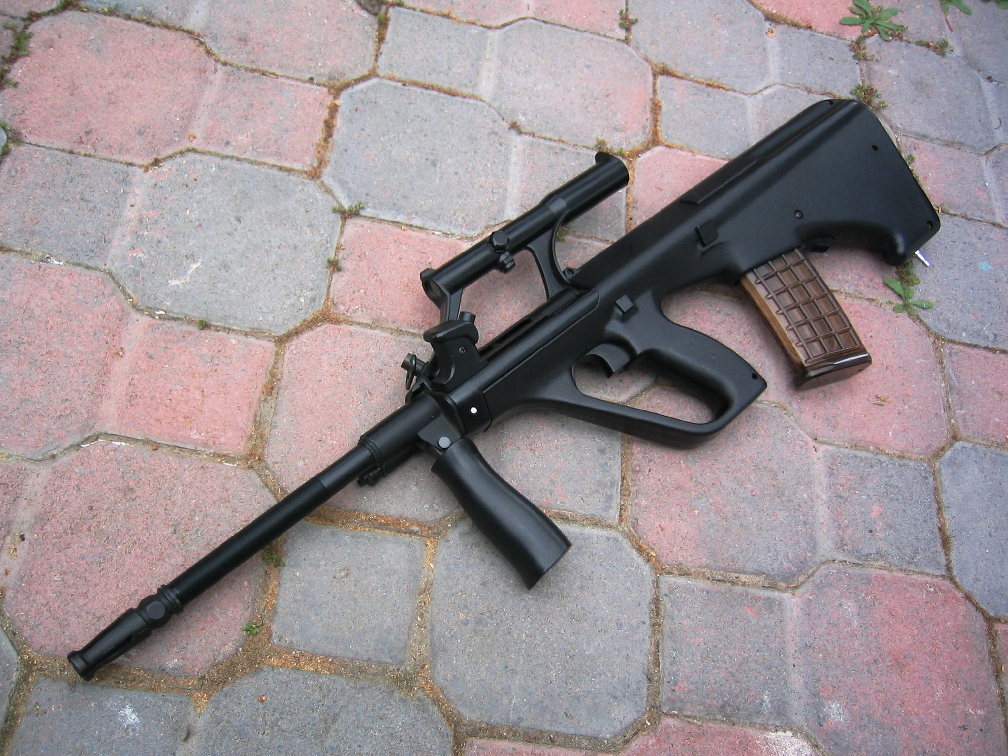 automatic, footpath, no people, cobblestone, bullpup, brick, paving stone, safety, rifle, weapon, high angle view, day, city, aggression, street, 1080P, HD Wallpaper