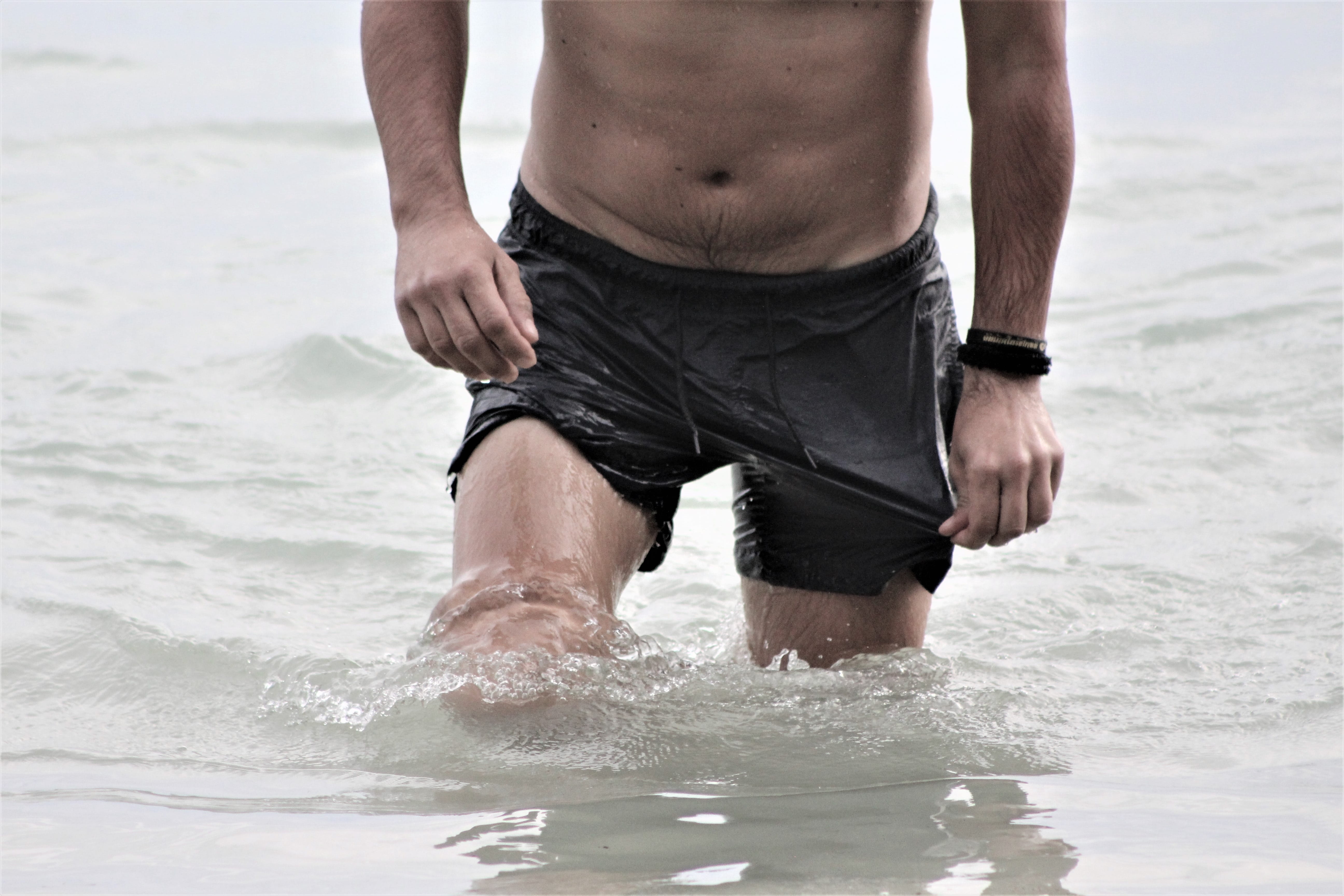 lifestyles, wet, beach, torso, nature, real people, human body part, sea, muscular, love, athlete, waterfront, man, belly, body, one person, water, body part, HD Wallpaper
