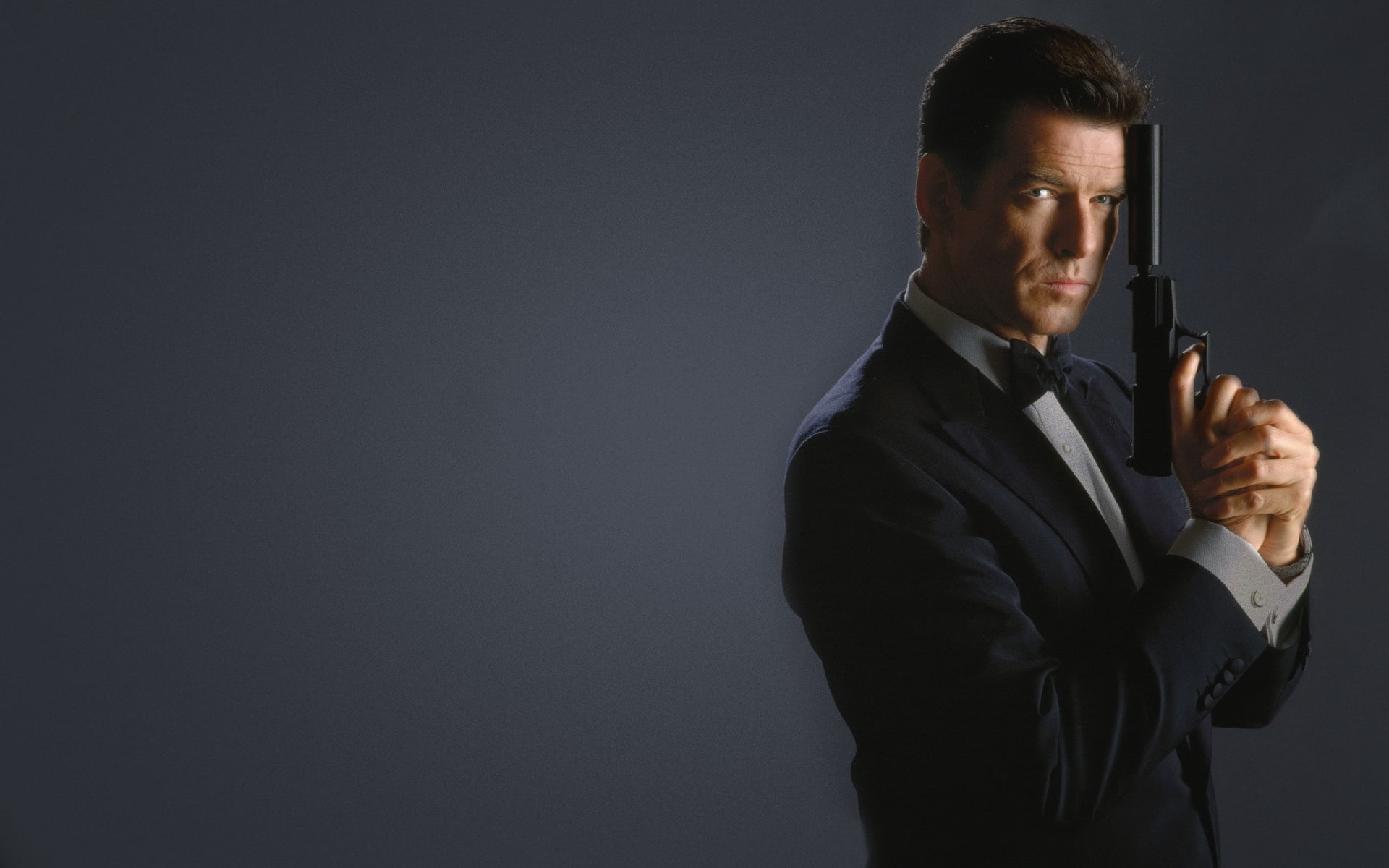 weapon, men, formalwear, menswear, 1080P, holding, 007, aggression, studio shot, business, businessman, males, James bond, adult, Pierce Brosnan, one person, HD Wallpaper