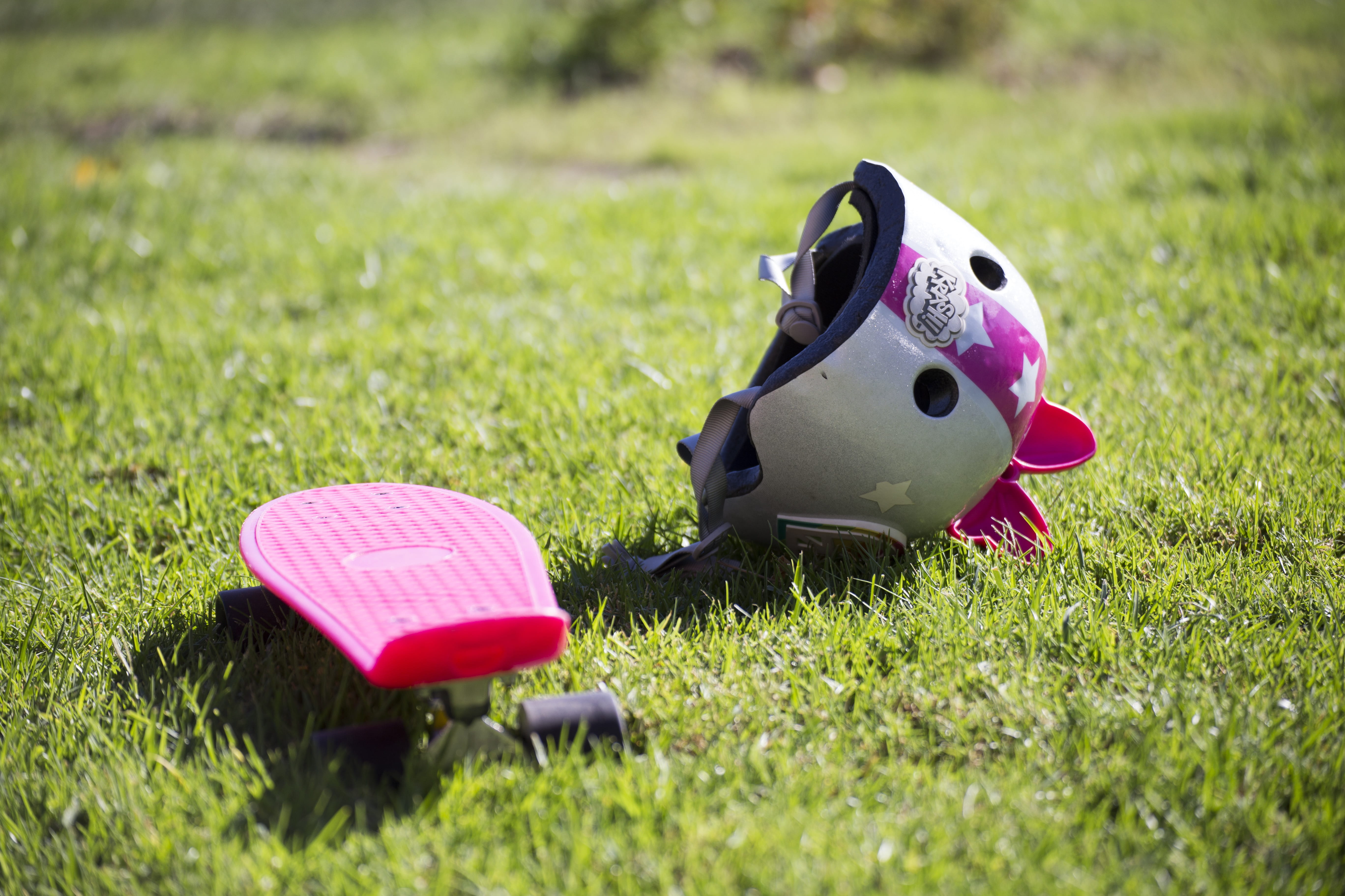 selective focus, close-up, active, childhood, field, skate, fun, young, absence, city, nature, recreation, grass, equipment, safety, playing, plant, child, HD Wallpaper
