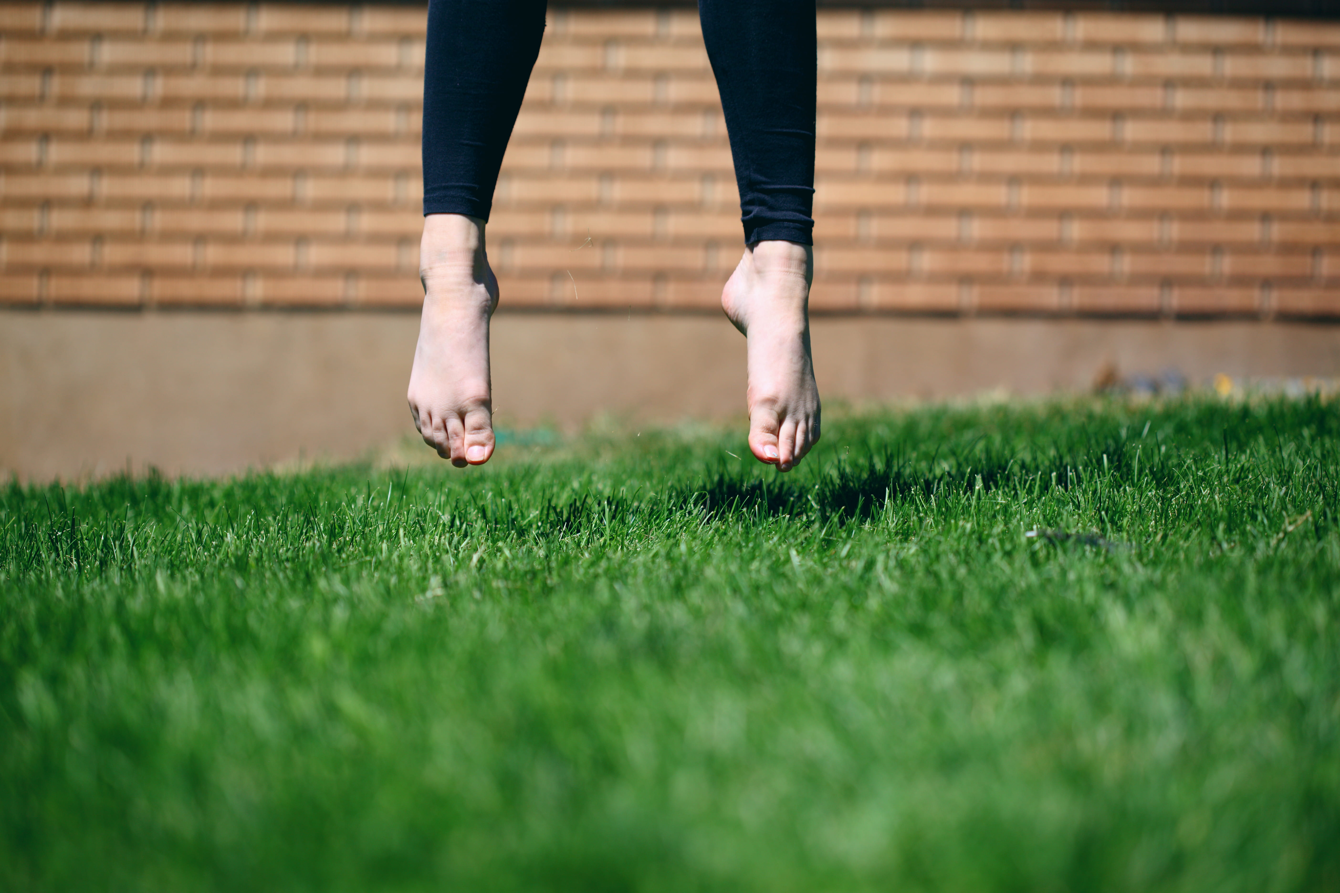 fresh, field, air, outdoor, human foot, jump, grass, wall, plant, legs, fashion, wearing, day, leggings, person, summer, 5K, selective focus, garden, brick wall, HD Wallpaper
