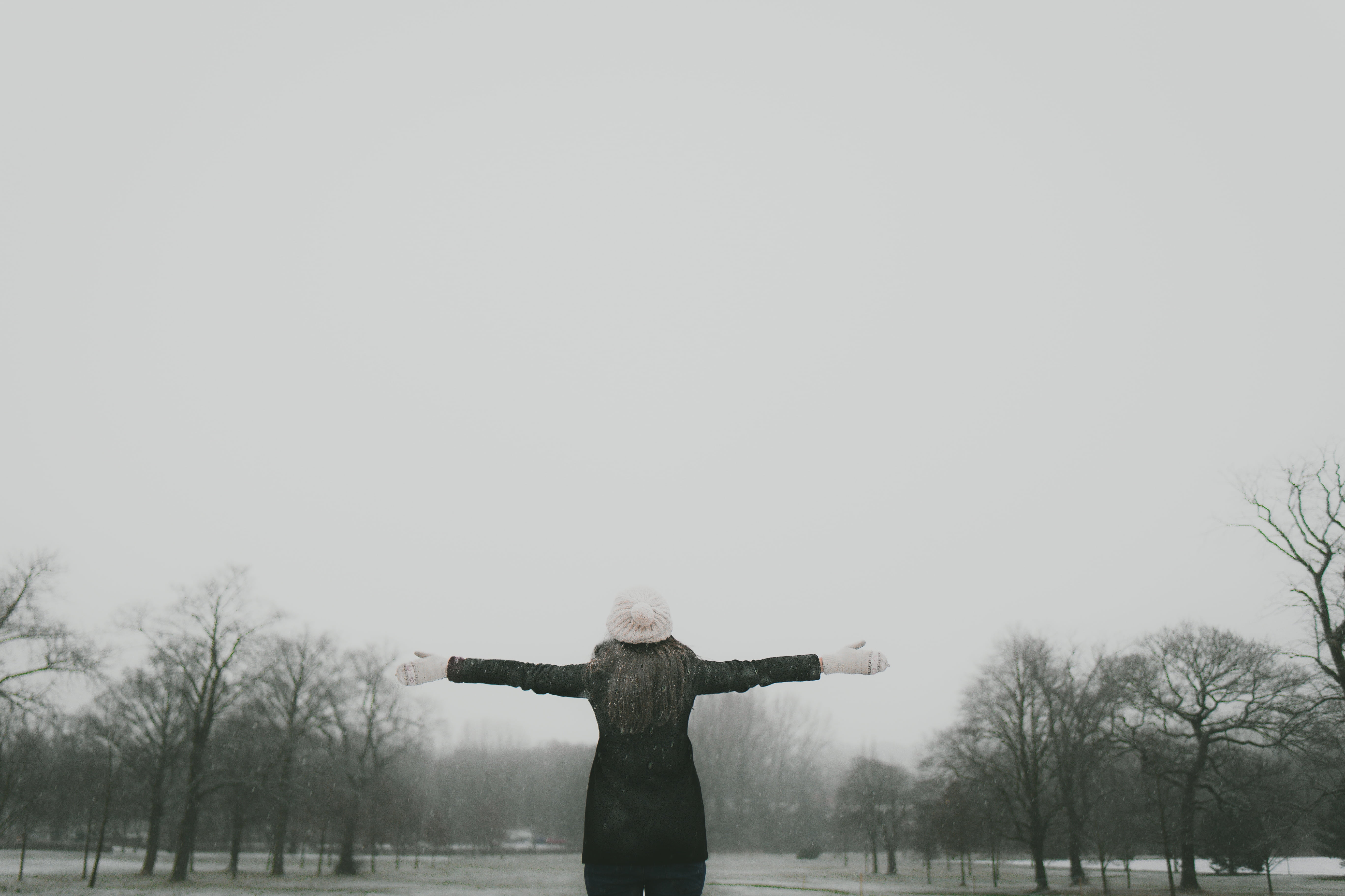 real people, winter, leisure activity, day, woman, snow, view, standing, grey, front view, surrounded, arms outstretched, women, bare tree, cold, trees, HD Wallpaper