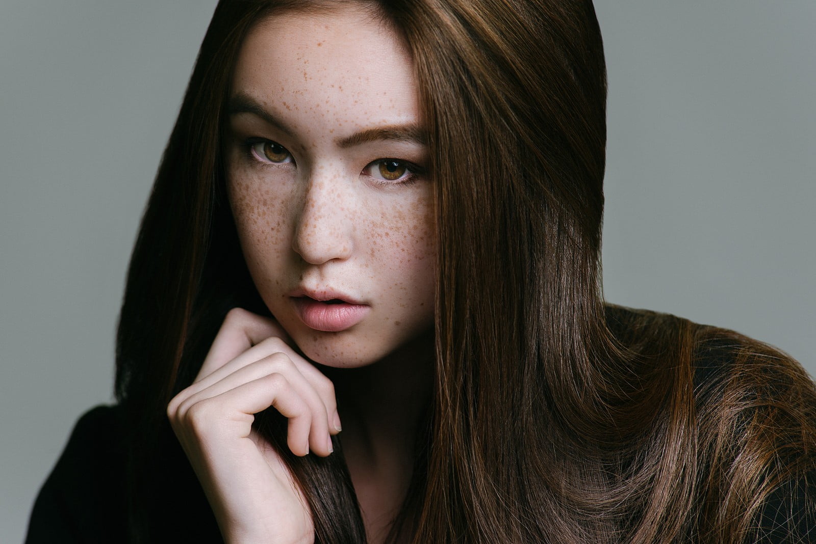 gray, 720P, young adult, indoors, hair, hairstyle, human face, brunette, adult, looking at camera, beauty, face, hazel eyes, young women, headshot, long hair, HD Wallpaper
