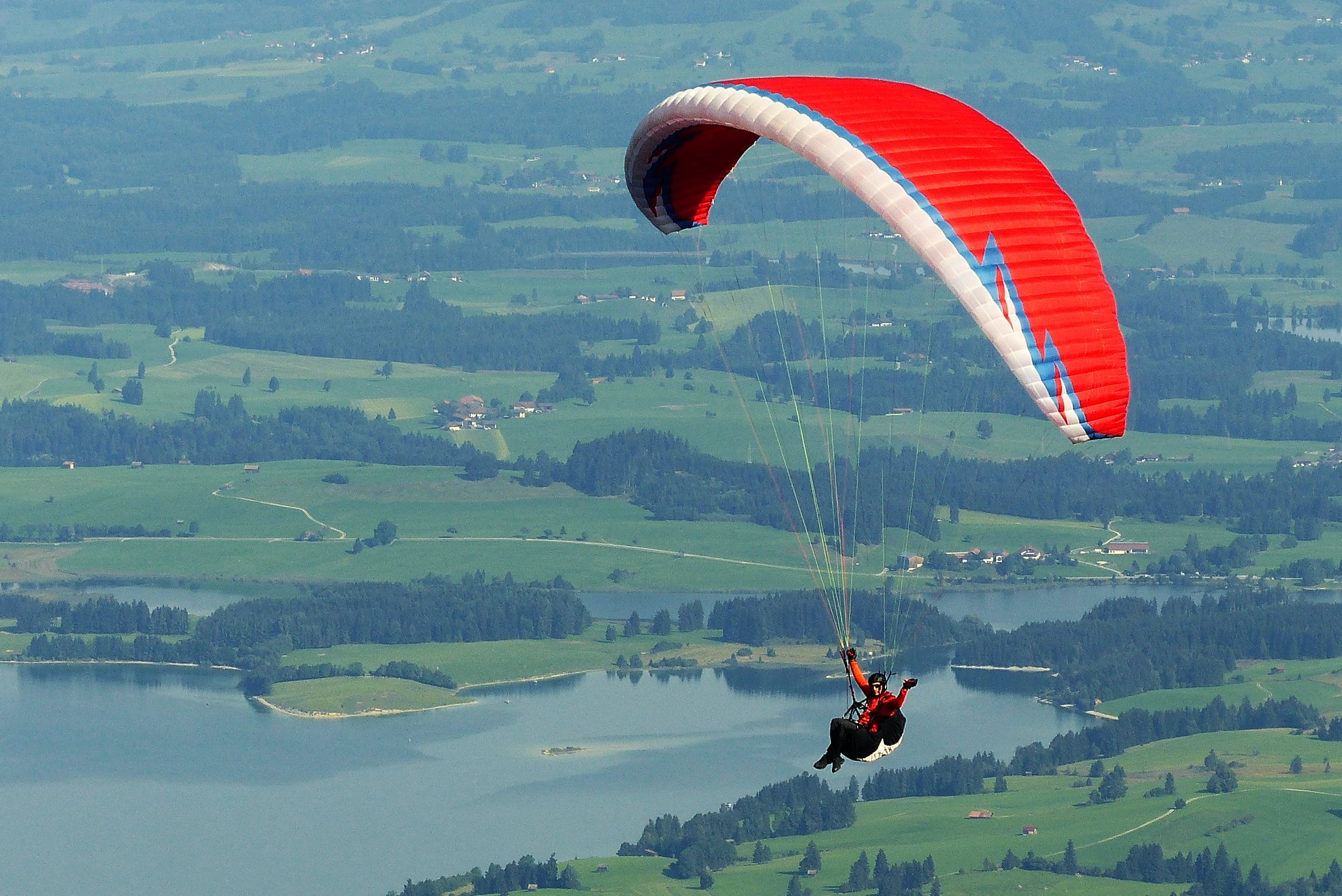 exhilaration, sport, joy, freedom, paraglider, positive emotion, outdoors, leisure activity, mid-Air, daytime, unrecognizable person, beauty in nature, HD Wallpaper
