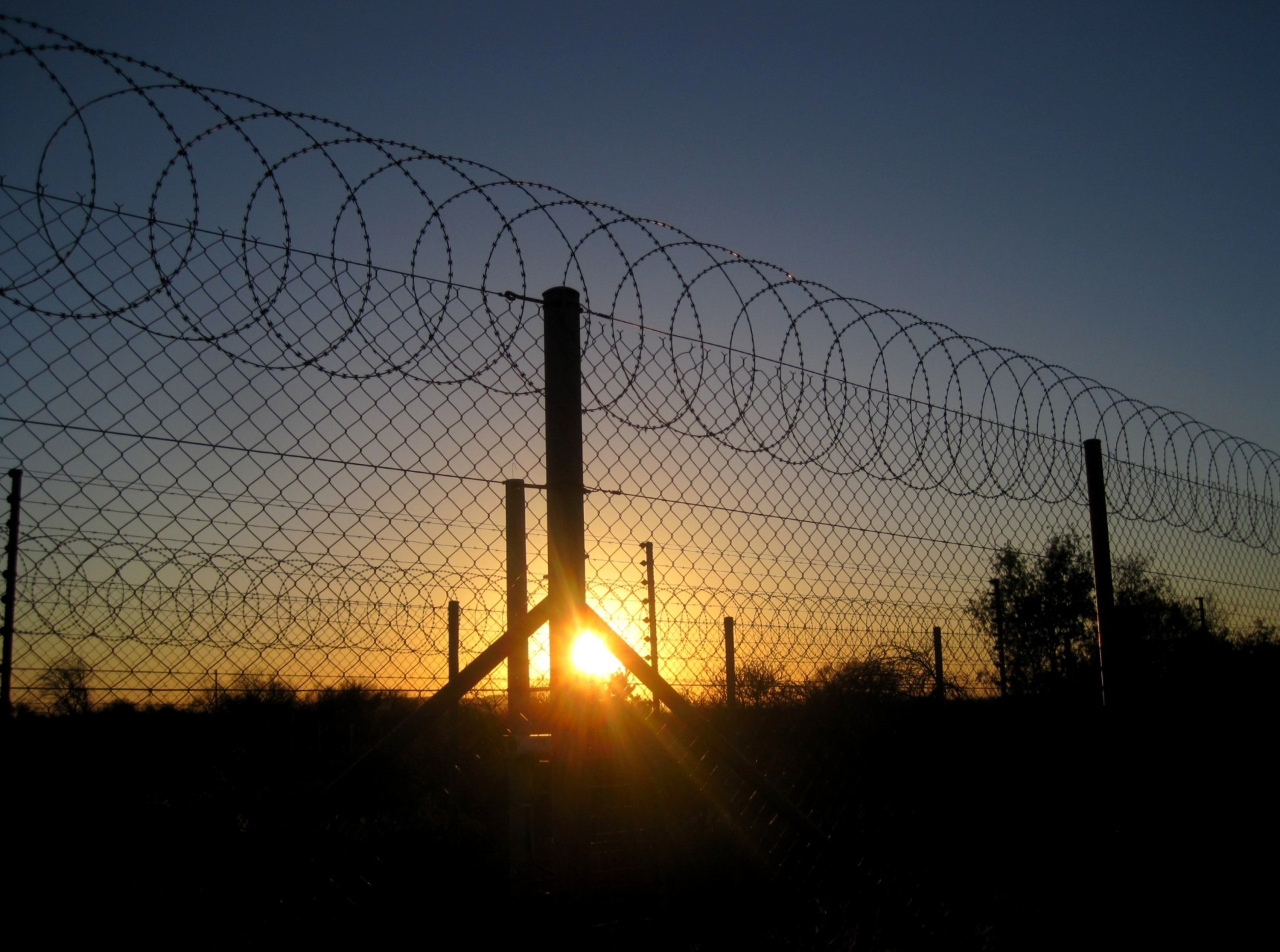 dawn, no people, barbed wire, protection, bright, sunrise, blue, metal, architecture, shiny, lens flare, nature, outdoors, yellow, sun, orb, wire, safety, HD Wallpaper