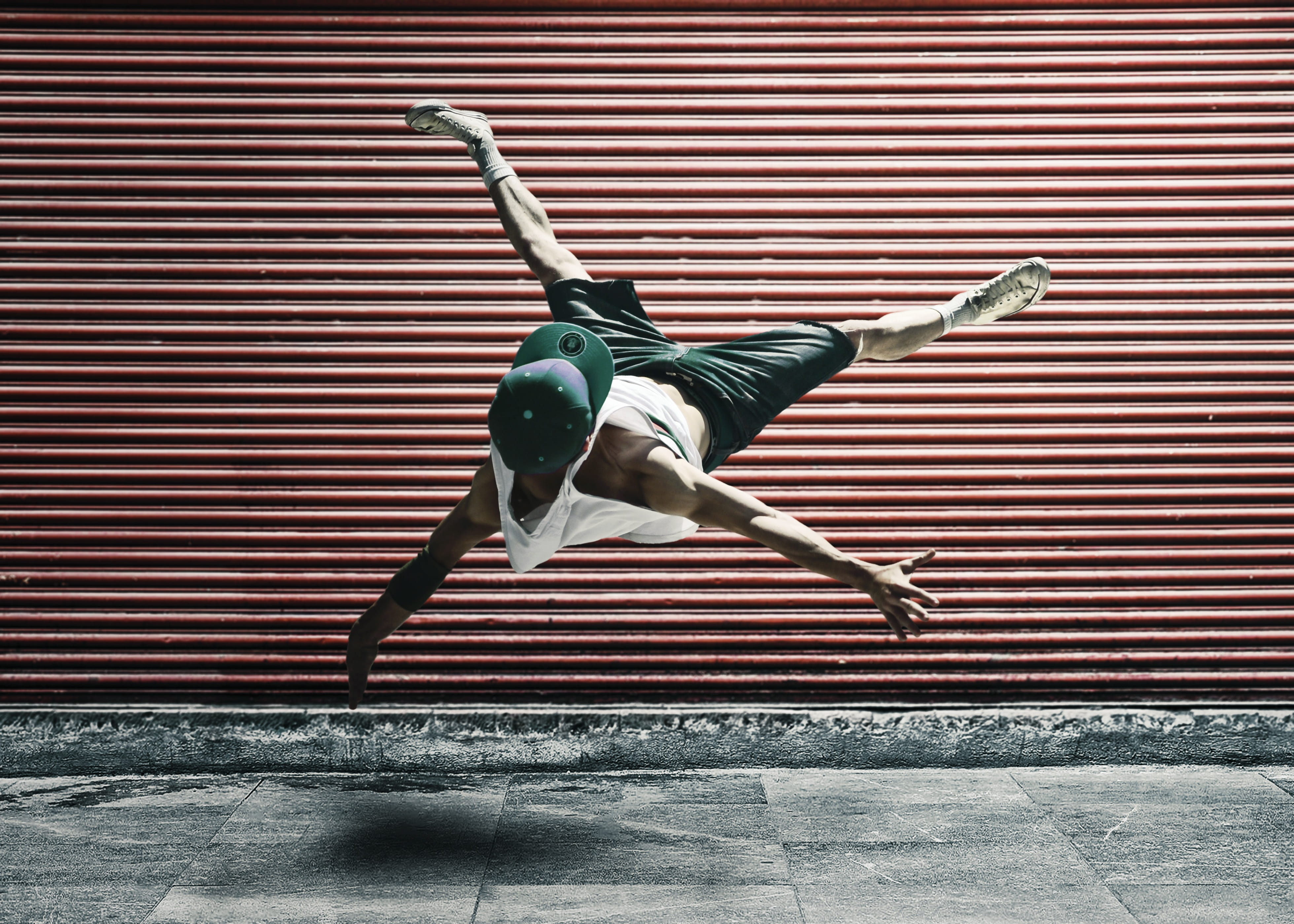 people, jumping, wall - building feature, built structure, skill, metal, dancing, 4K, handstand, mid-air, outdoors, red, air, real people, architecture, HD Wallpaper