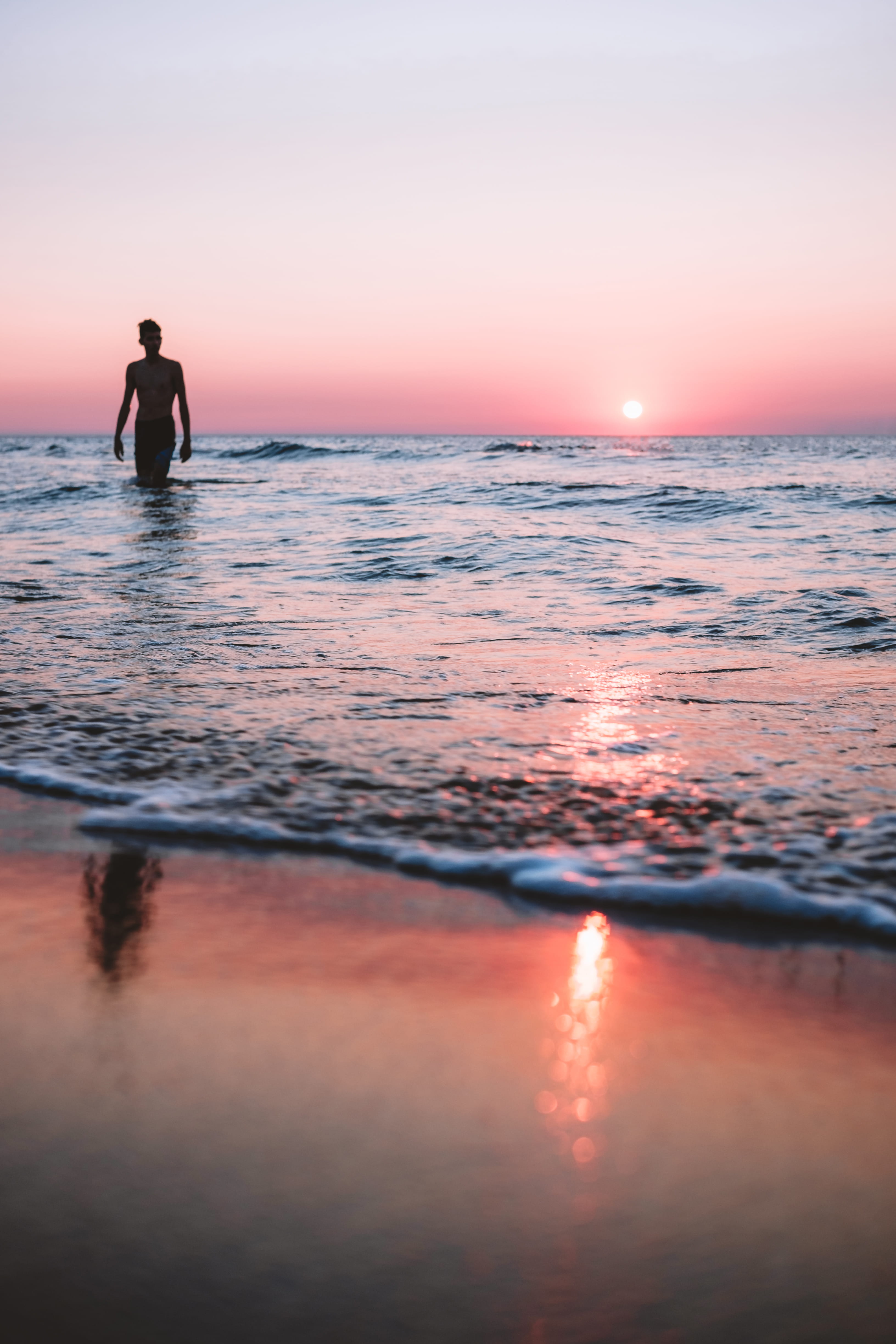 portrait, horizon, water, leisure Activity, wave, dawn, travel, reflection, moody, male, males, romance, orange Color, people, beauty In Nature, nature, Phone HD Wallpaper