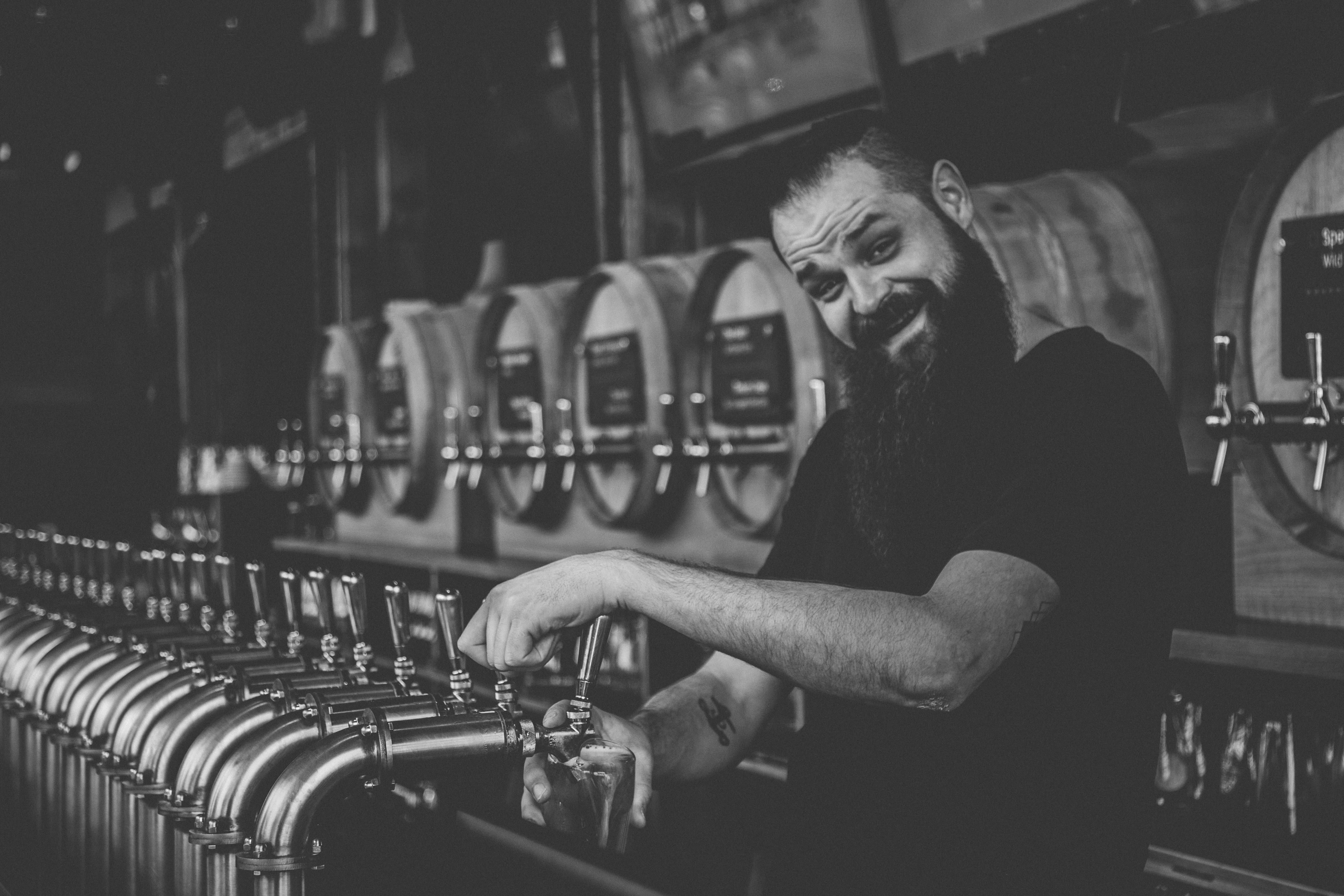 business, casual clothing, dispenser, mature men, beard, skill, focus on foreground, indoor, man, black and white, 4K, pour, dark, male, metal, working, HD Wallpaper