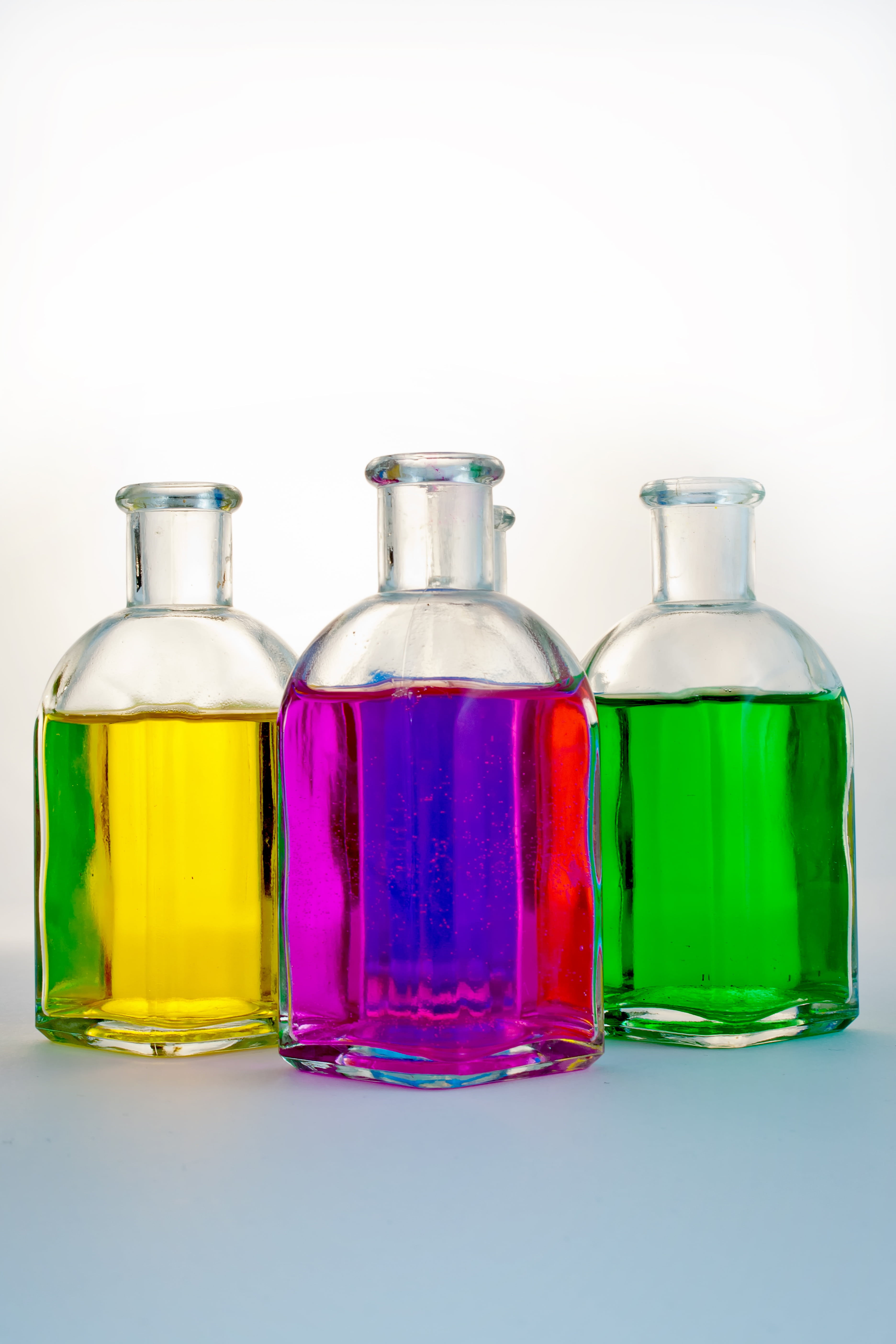 red, lot, white background, indoors, container, bottle, choice, multi colored, yellow, many, bottles, abstract, studio shot, spring, pink color, color, Phone HD Wallpaper