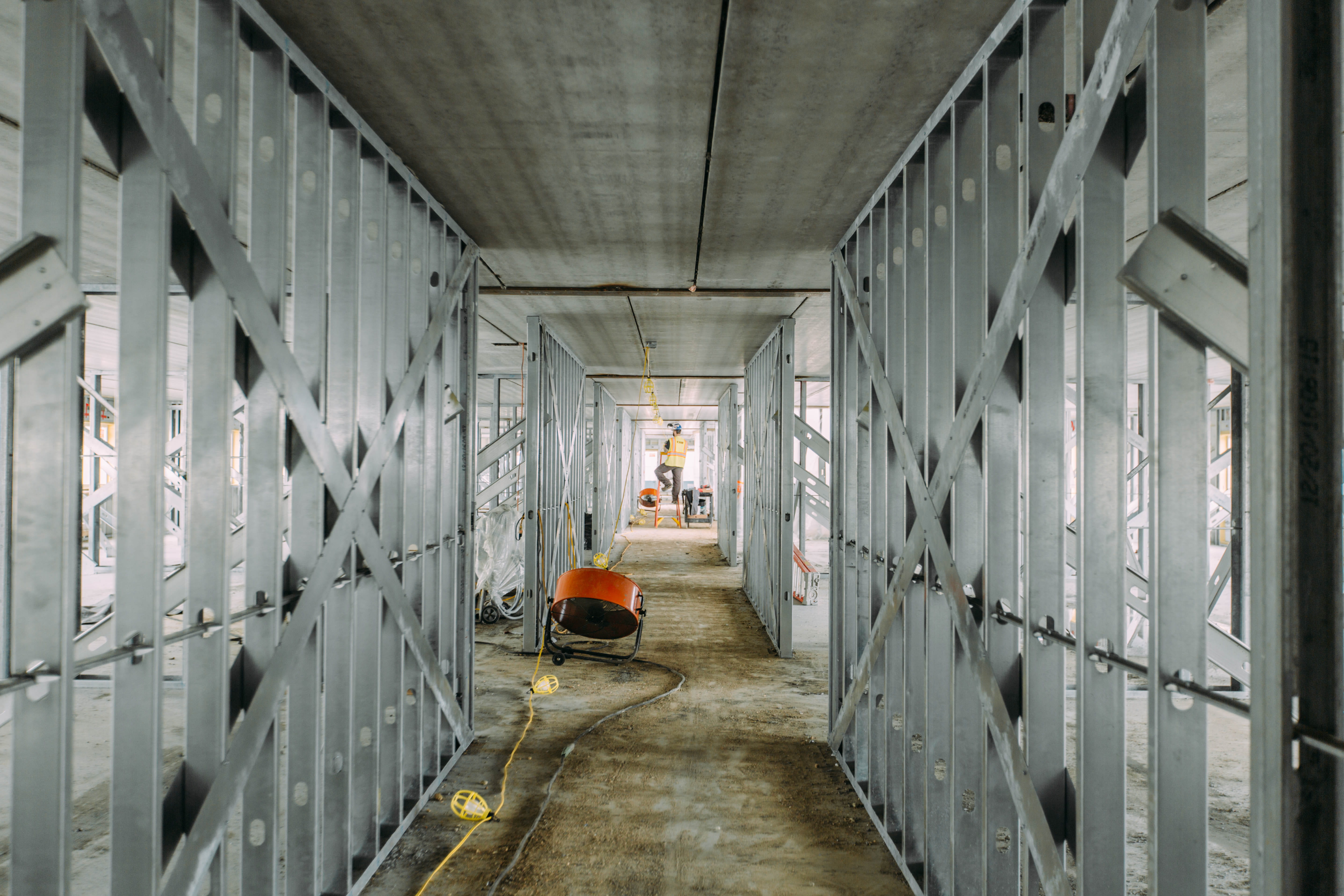 men, construction, 5K, walking, indoors, the way forward, direction, prison, vest, worker, architecture, corridor, under construction, arcade, illuminated, HD Wallpaper
